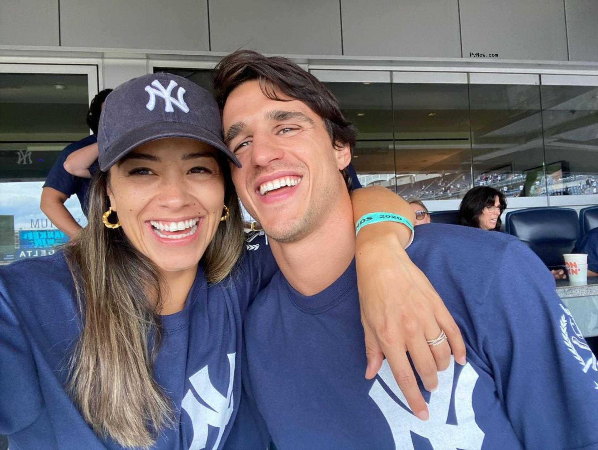 Gina Rodriguez and Joe LoCicero smile at ba<i></i>seball game