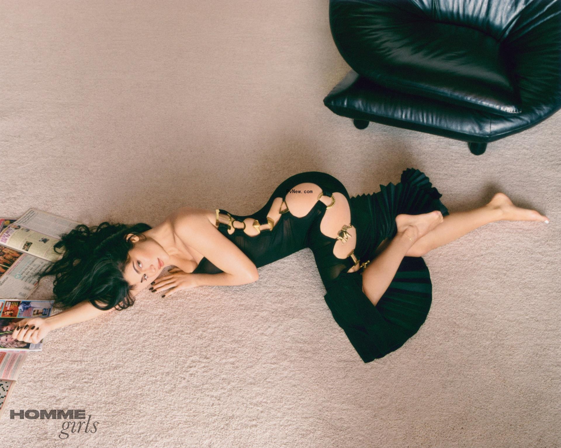 Kylie Jenner lounges in cutout dress