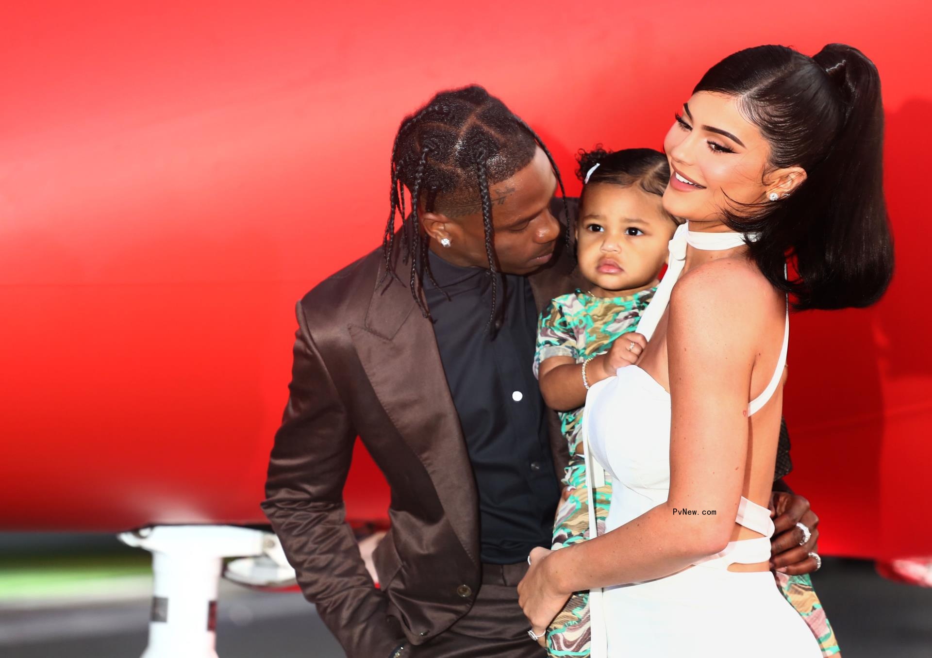 Kylie Jenner holds daughter Stormi on red carpet with Travis Scott