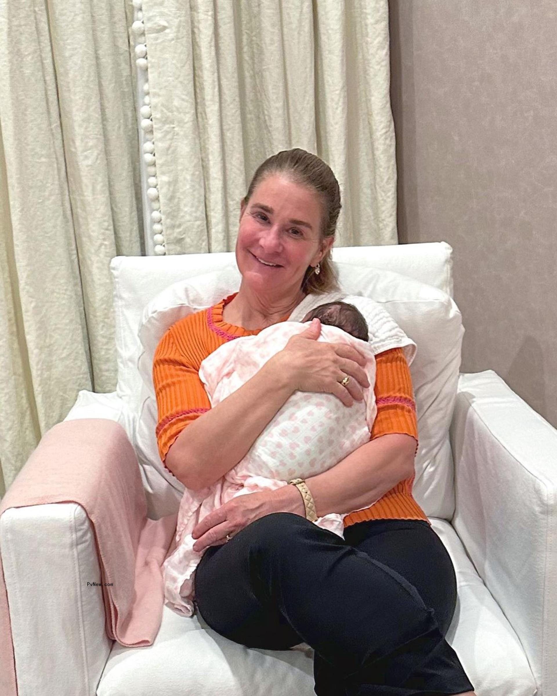 Melinda Gates holding her granddaughter.