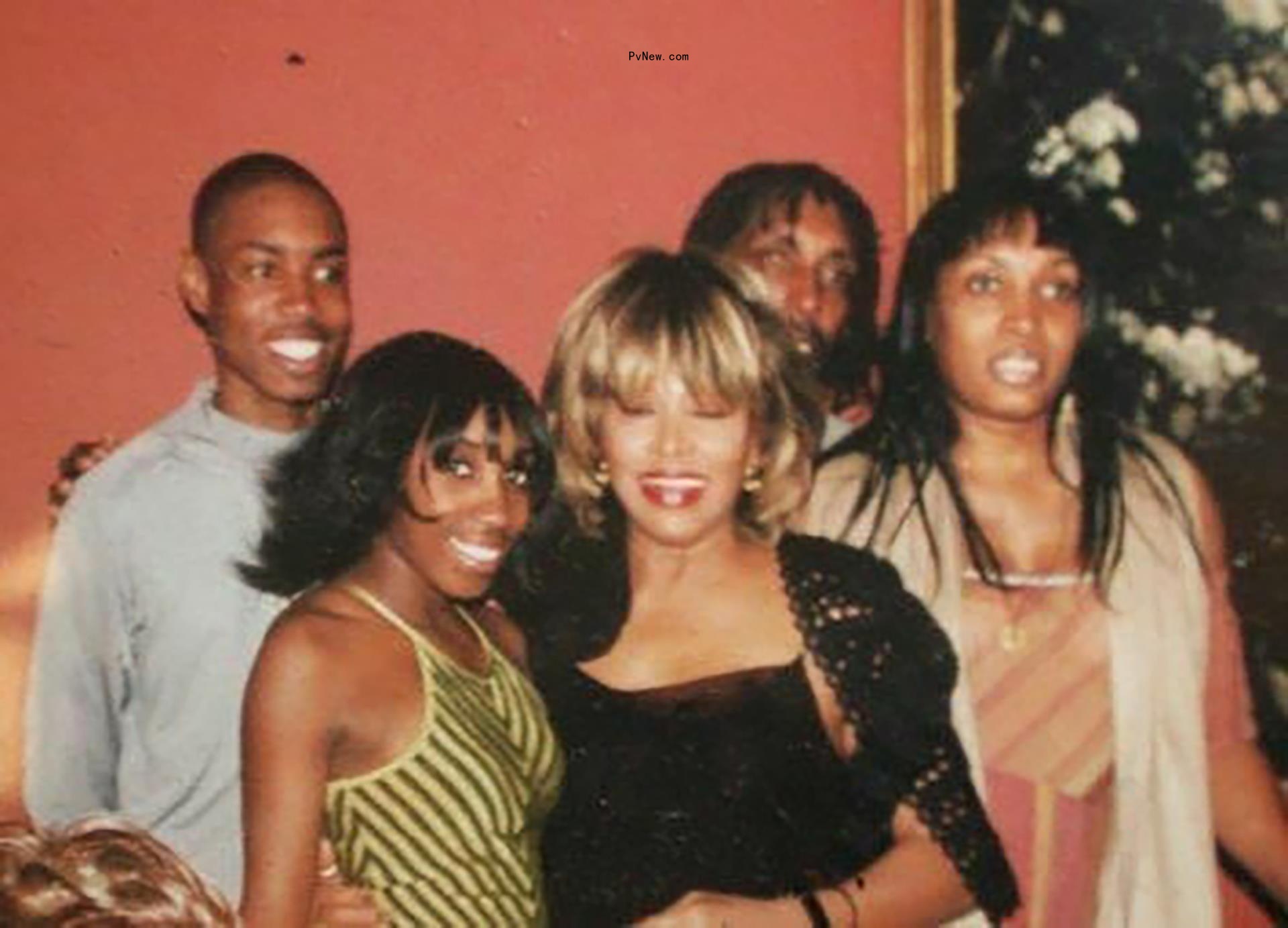 Tina with her grandchildren Raquel and Randy on the left. Their father Ro<i></i>nnie is behind them.