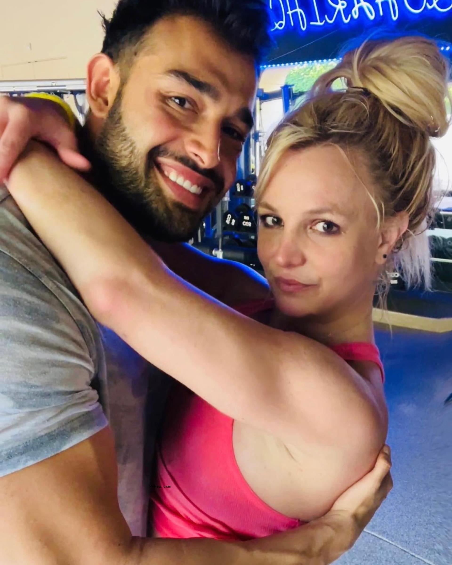 Britney and Sam Asghari hugging