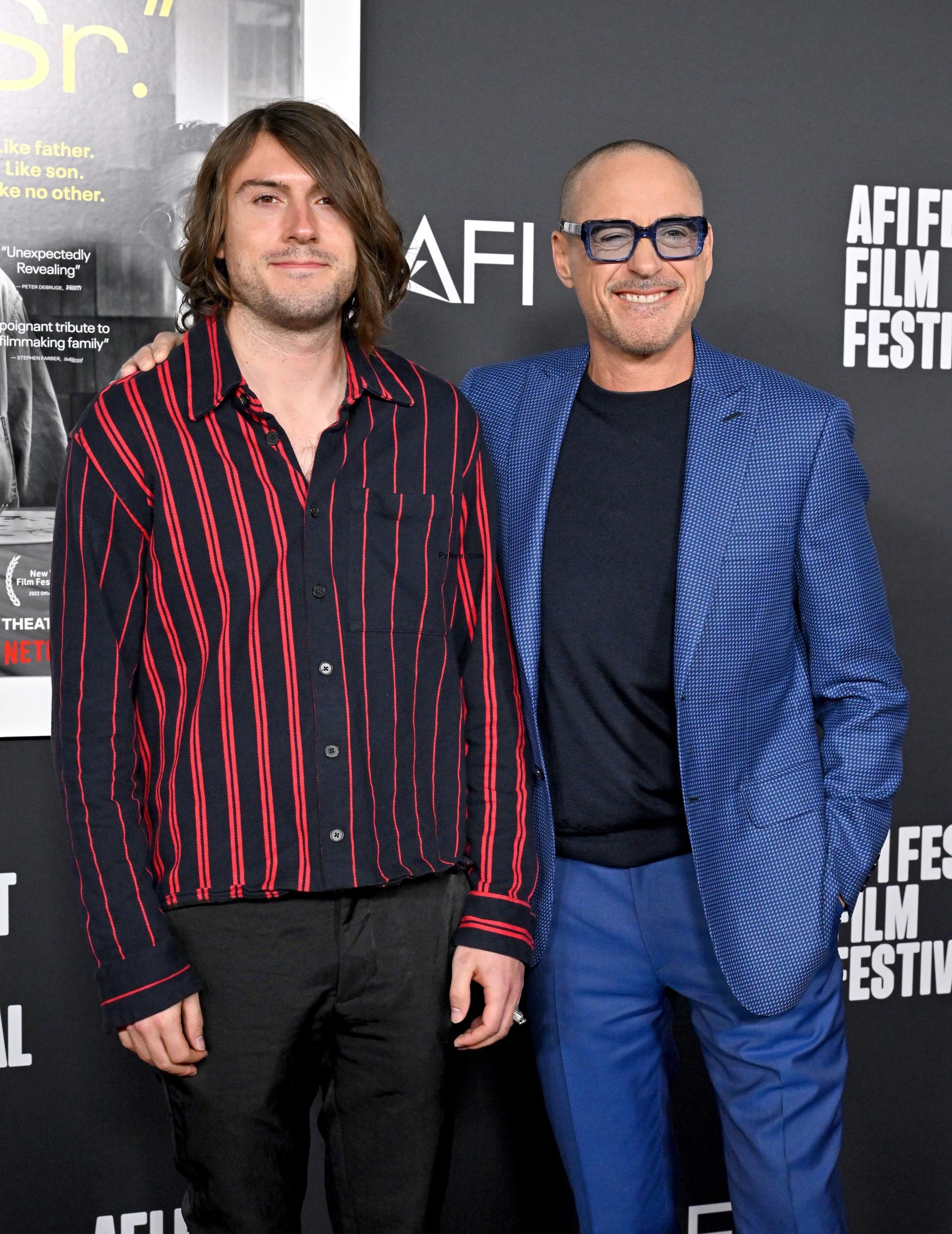 Indio Falco<i></i>ner Downey and Robert Downey Jr. posing for a red carpet