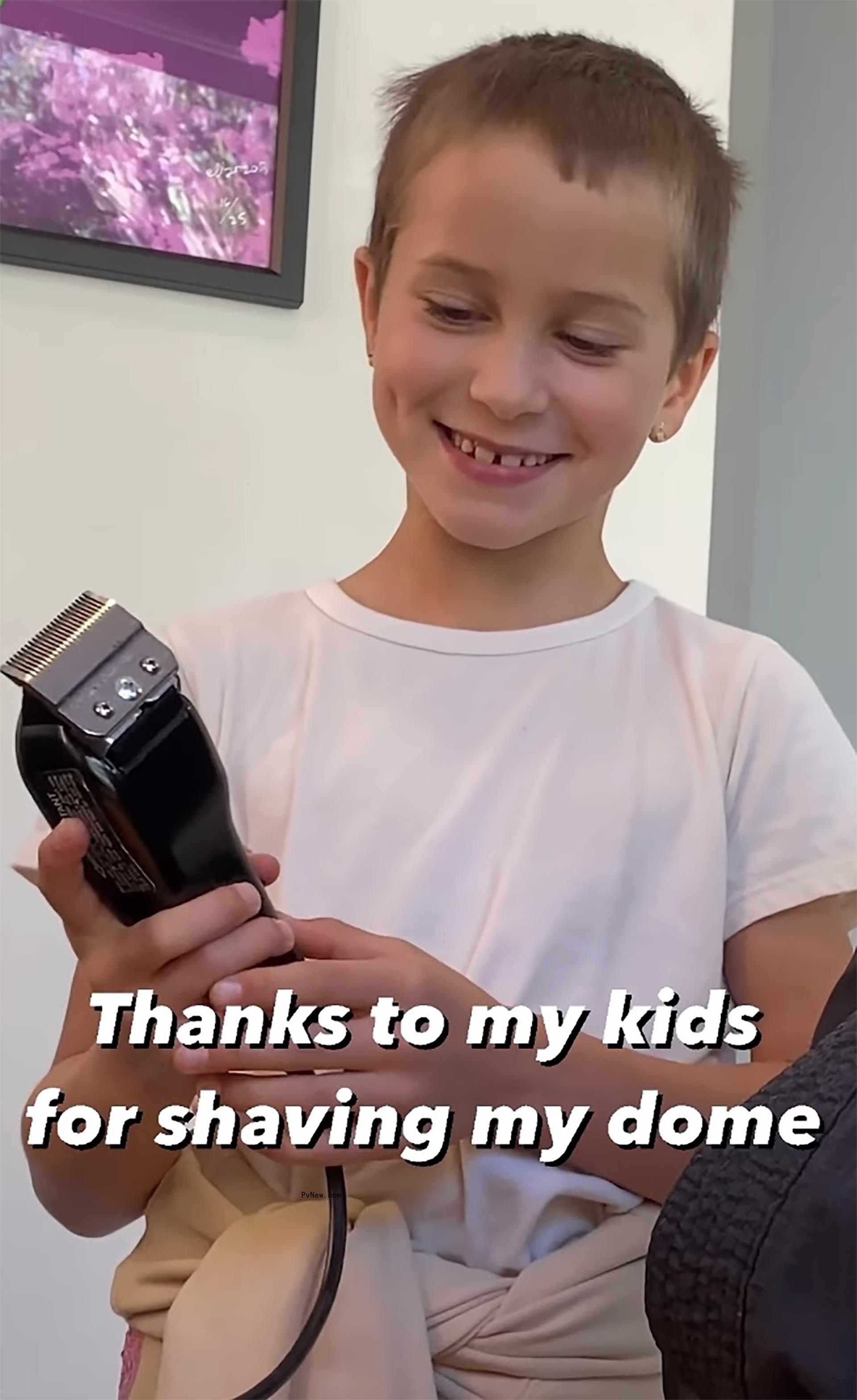 Avri shavin<i></i>g Robert Downey Jr.'s head