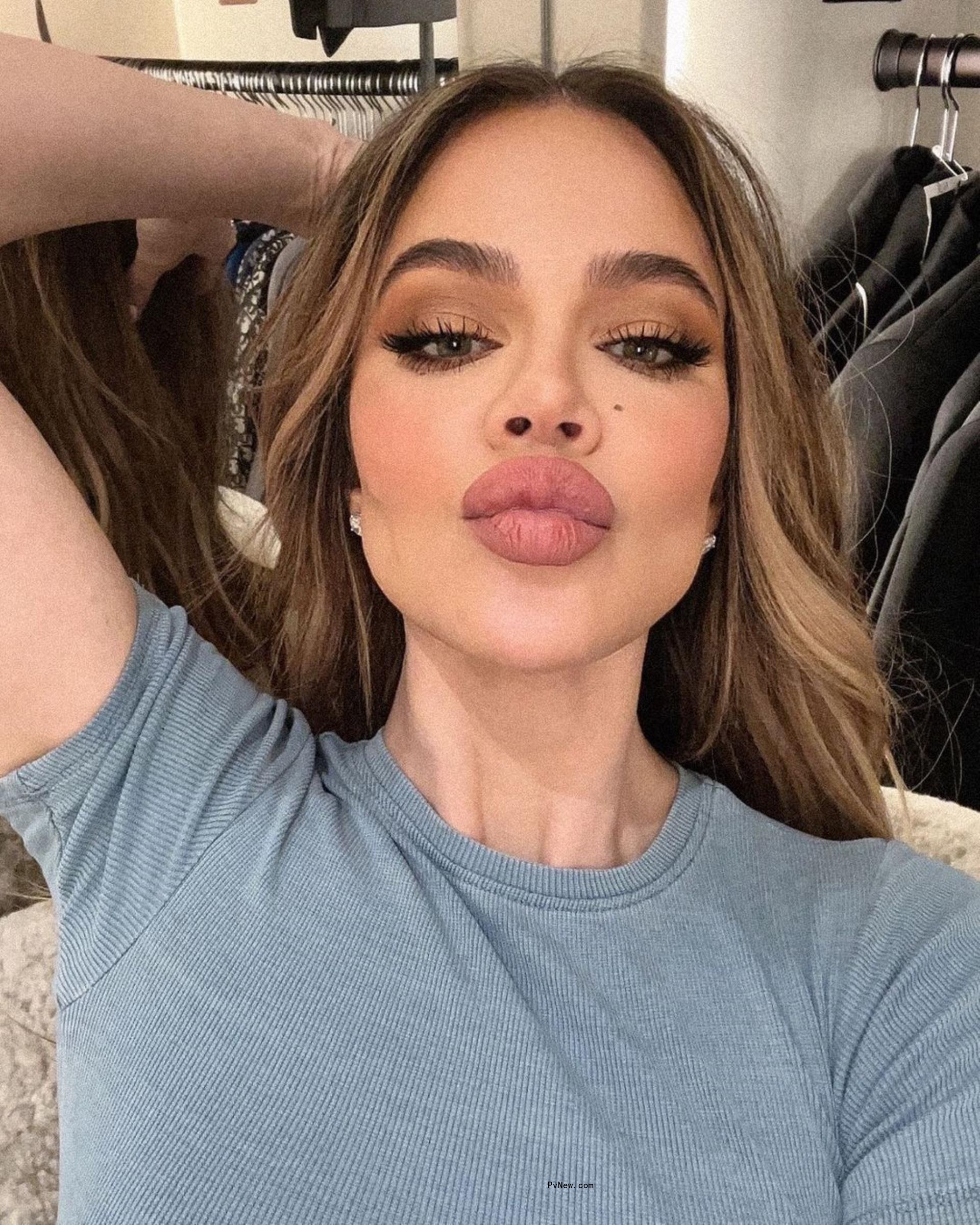 A selfie of Khloé Kardashian puckering her lips.