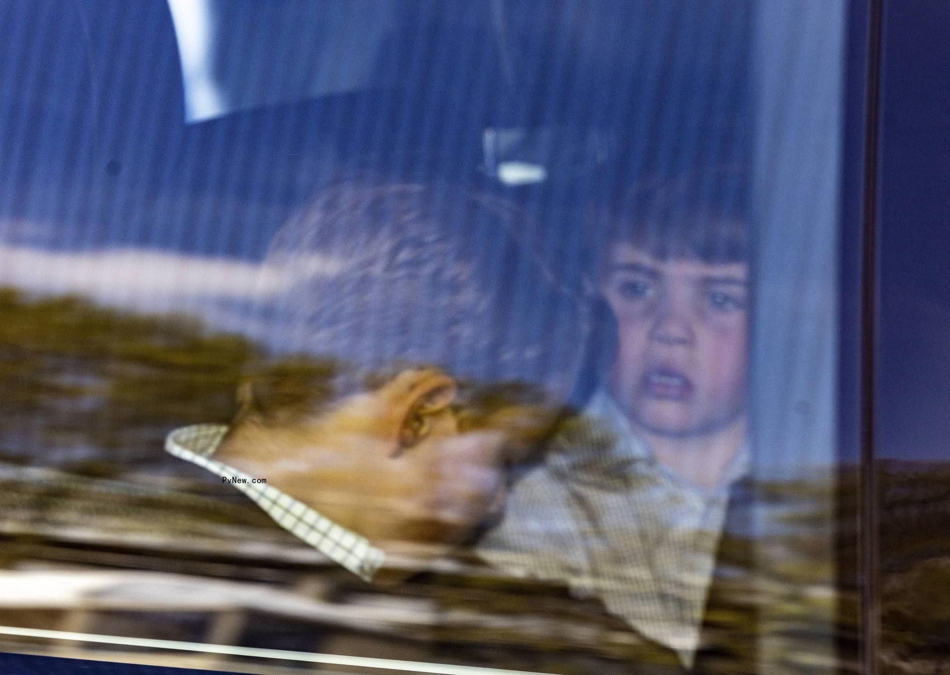 Prince George and Prince Louis sit in backseat