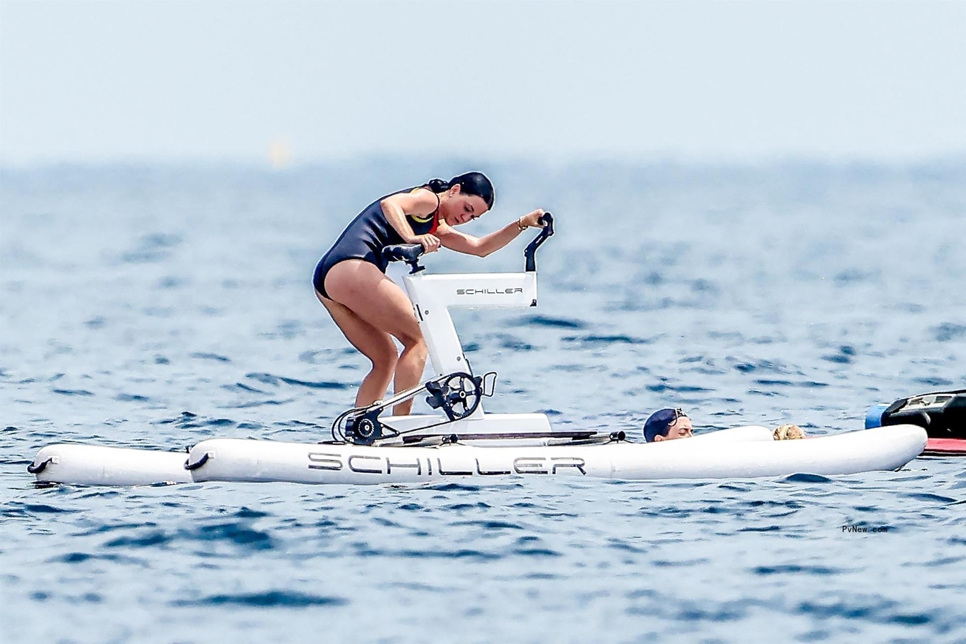 Katy Perry on a water bike