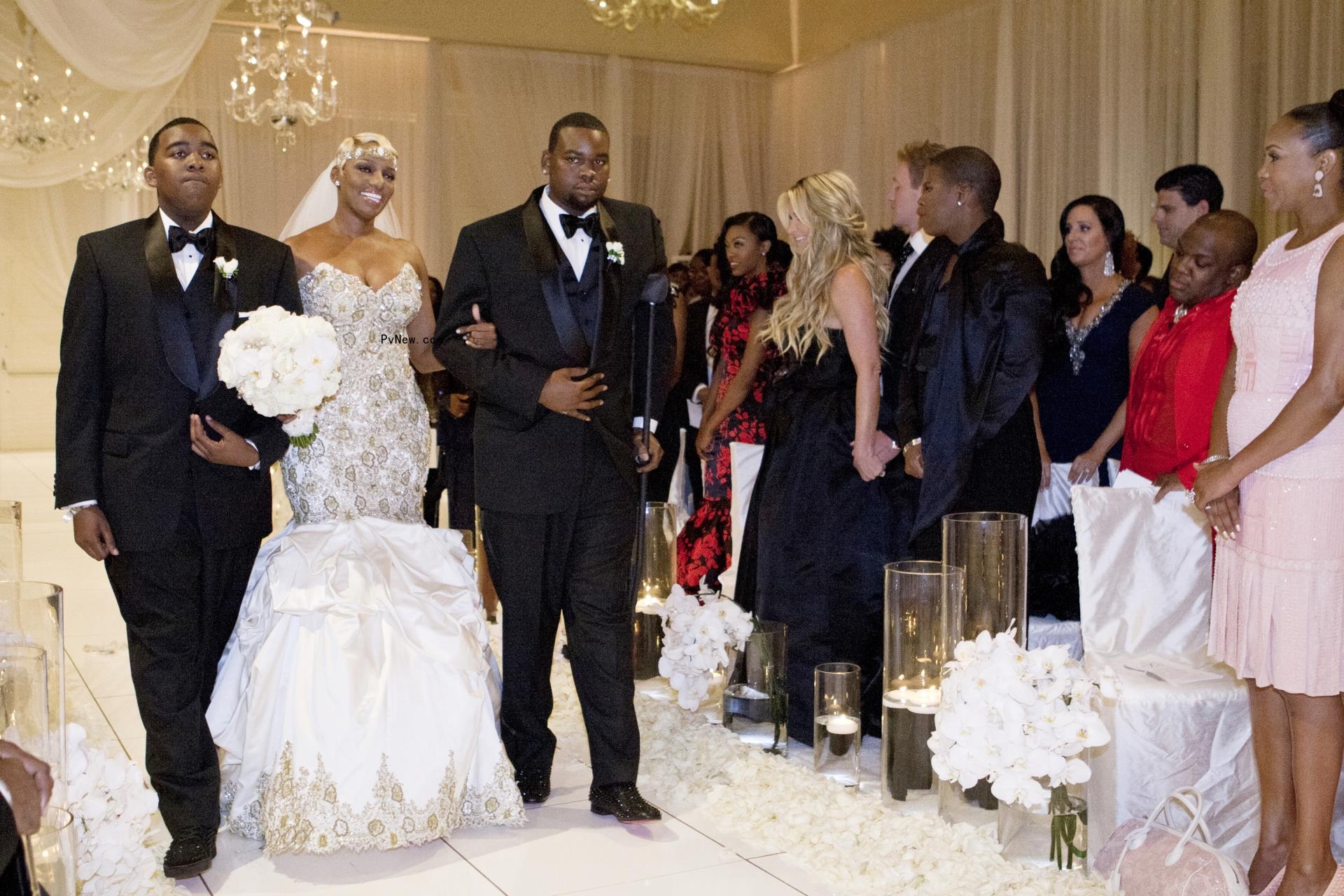 NeNe Leakes walking down the aisle with her sons.