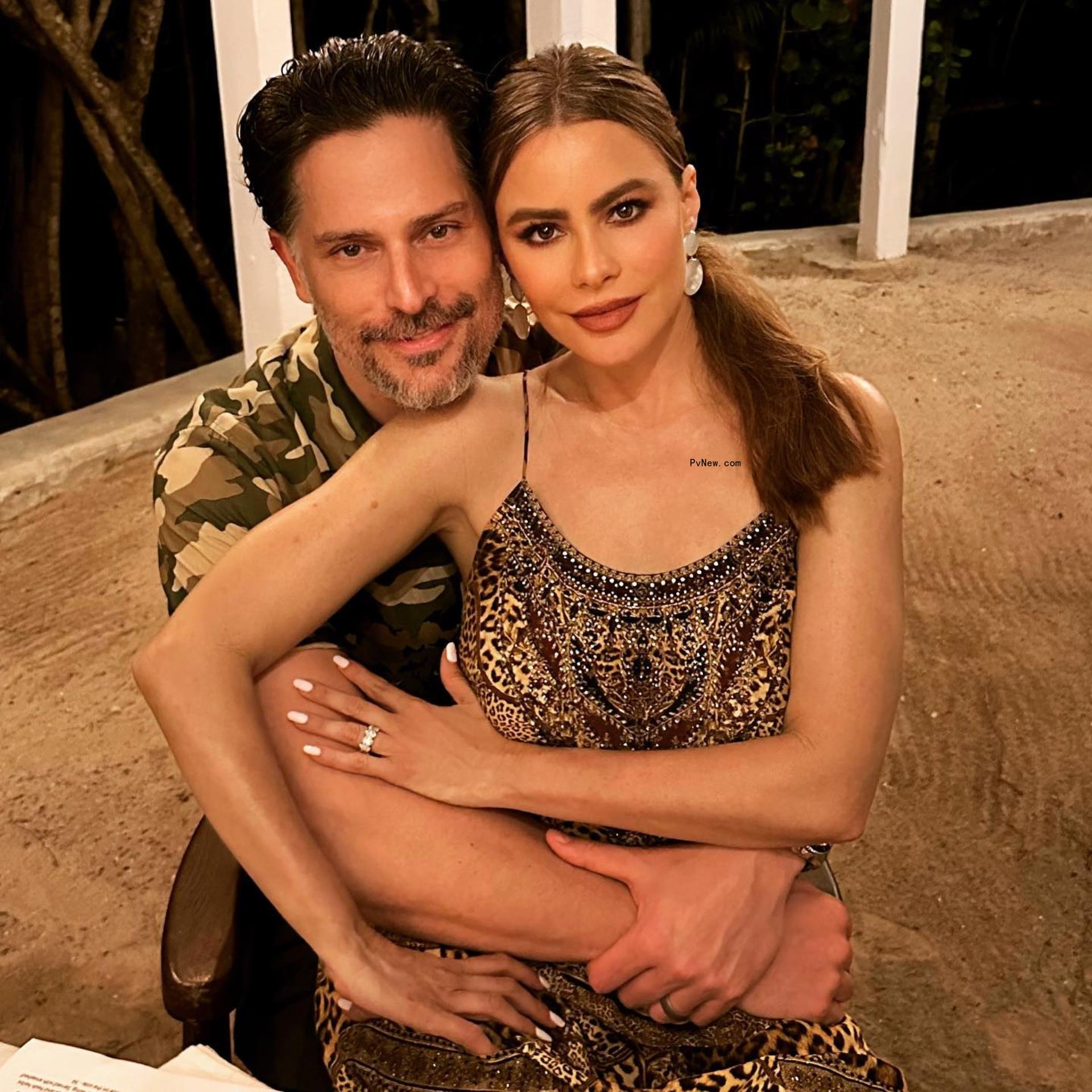 Sofía Vergara sitting on Joe Manganiello's lap.