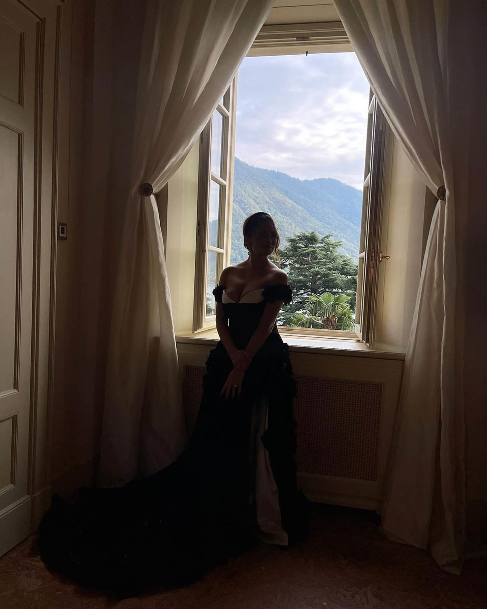 Chrissy Teigen wearing a vow renewal dress