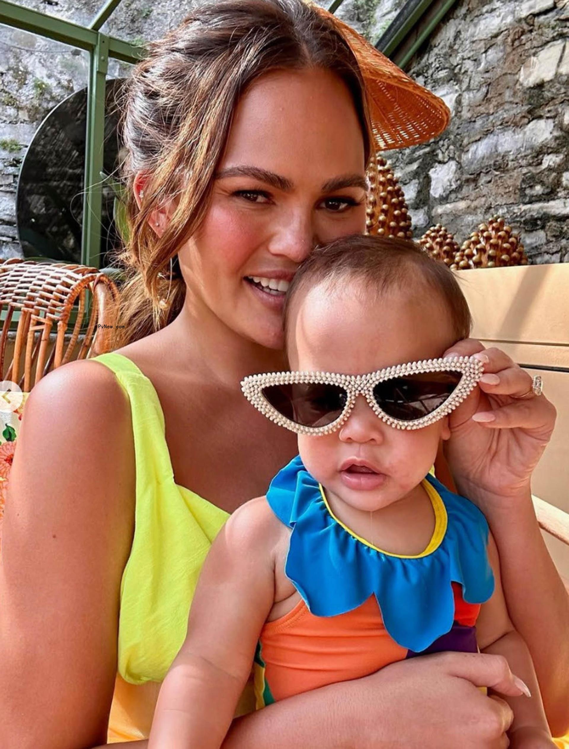 A selfie of Chrissy Teigen with her baby