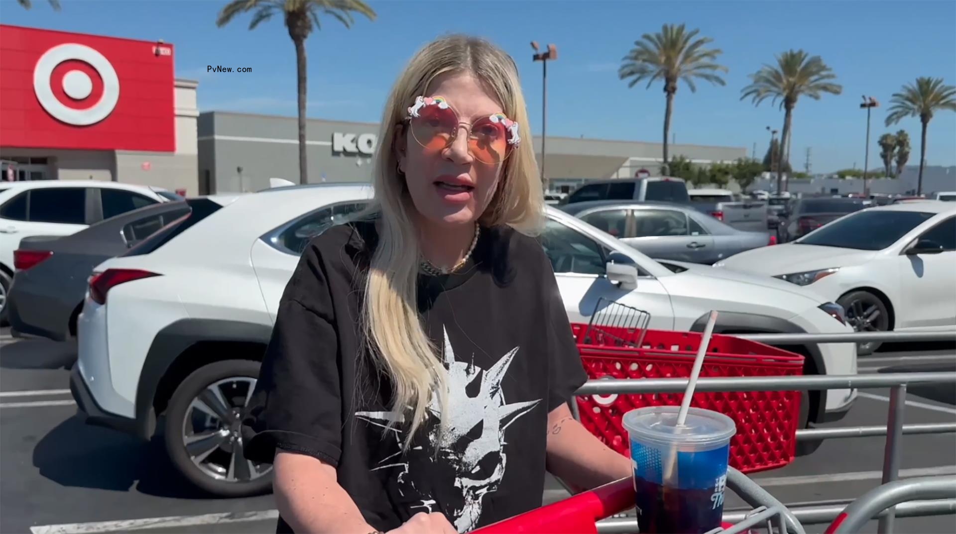 Tori Spelling in a Target parking lot.