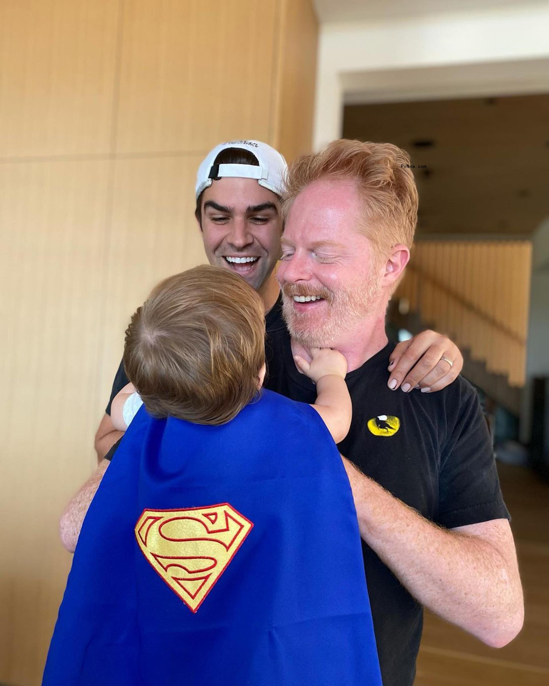 Jesse Tyler Ferguson, Justin Mikita and their oldest son, Beckett.