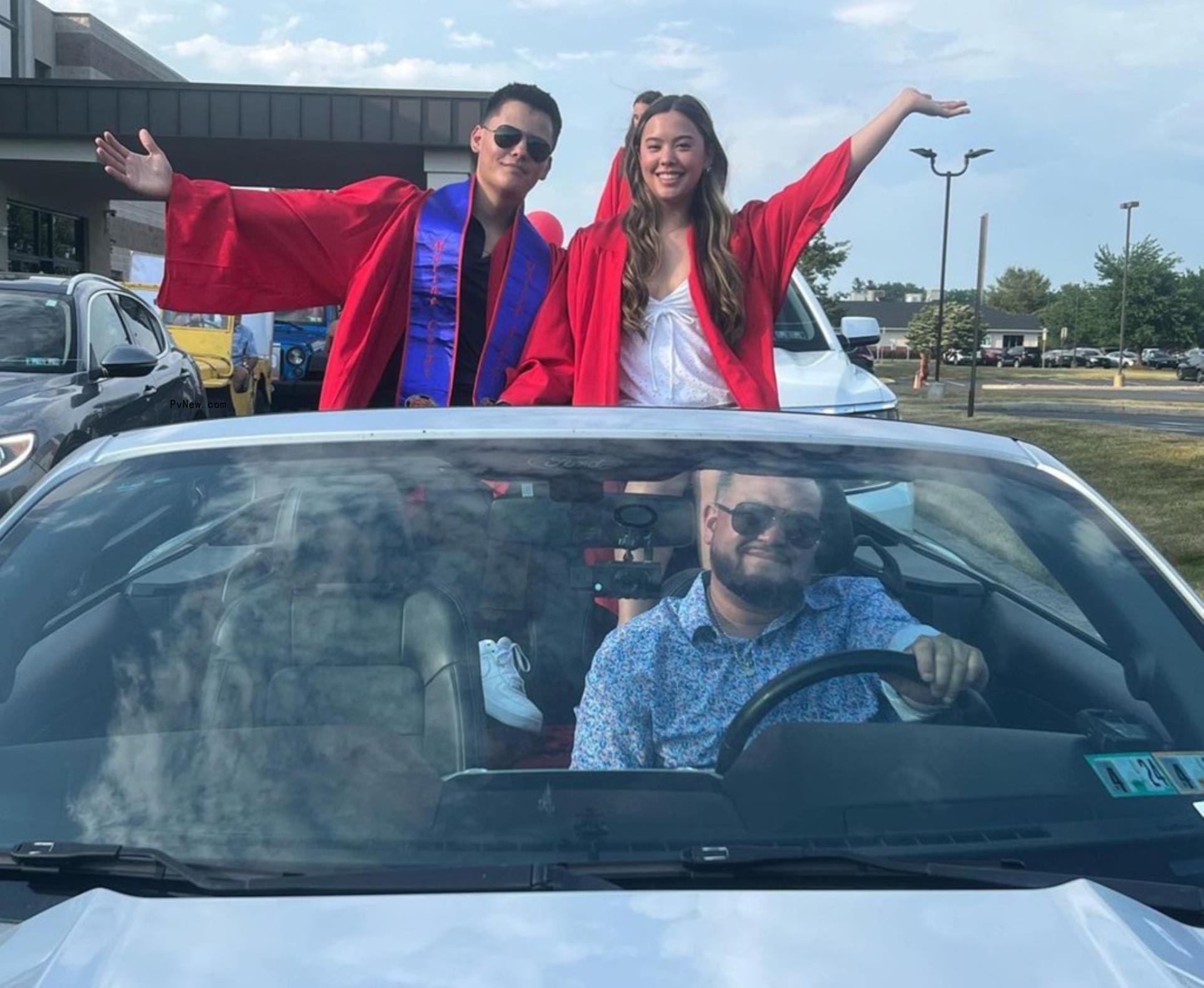 Hannah Gosselin and Collin Gosselin in the back of a co<i></i>nvertible while Jon Gosselin is in the driver's seat.