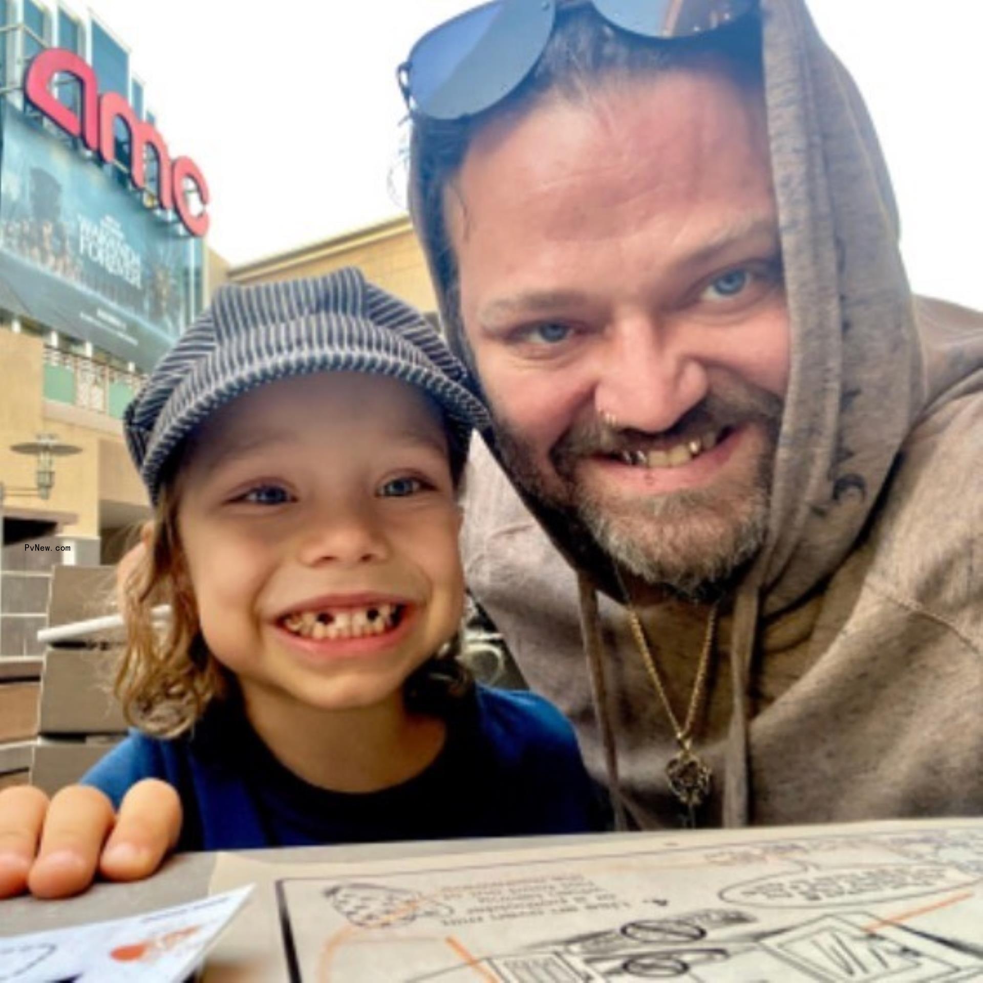 Bam Margera posing for a selfie with son Pheonix