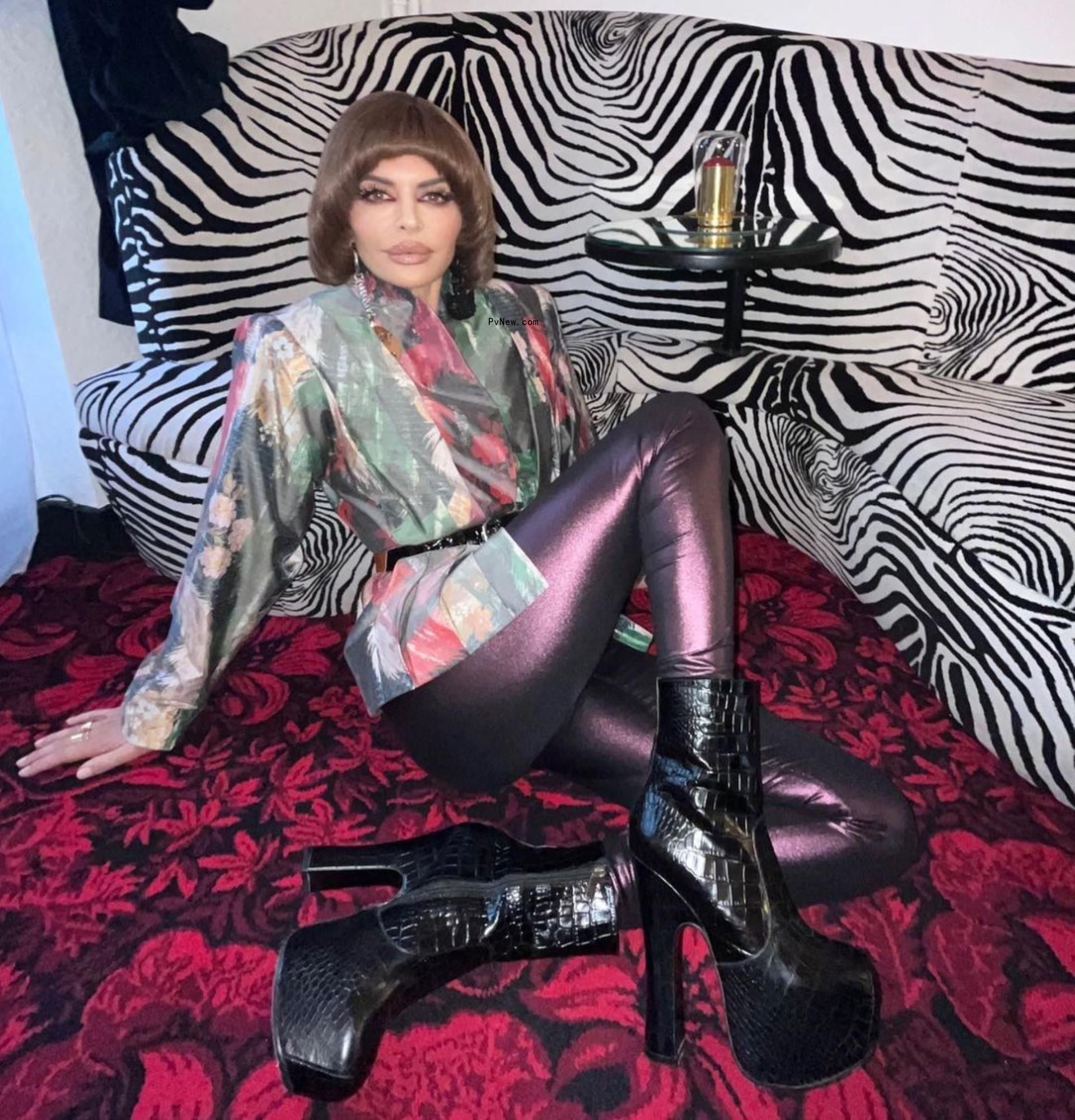 Lisa Rinna posing at Paris Fashion Week