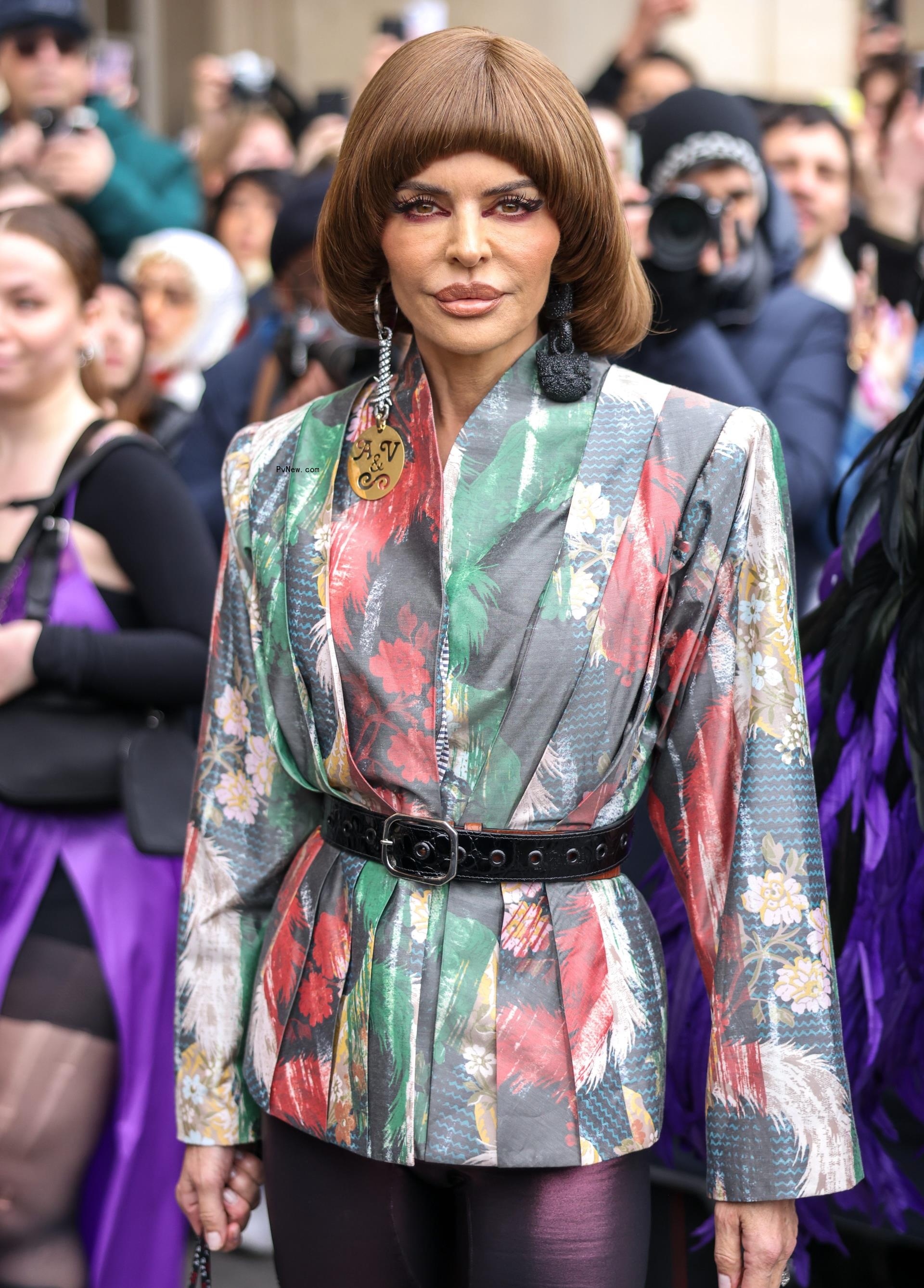 Lisa Rinna posing at Paris Fashion Week