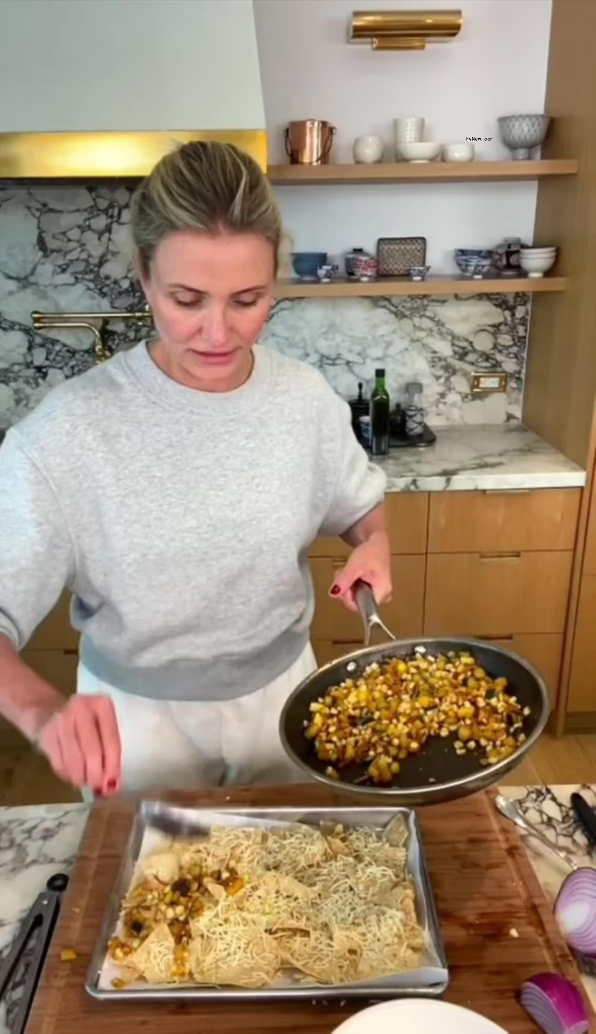Cameron Diaz cooking nachos.