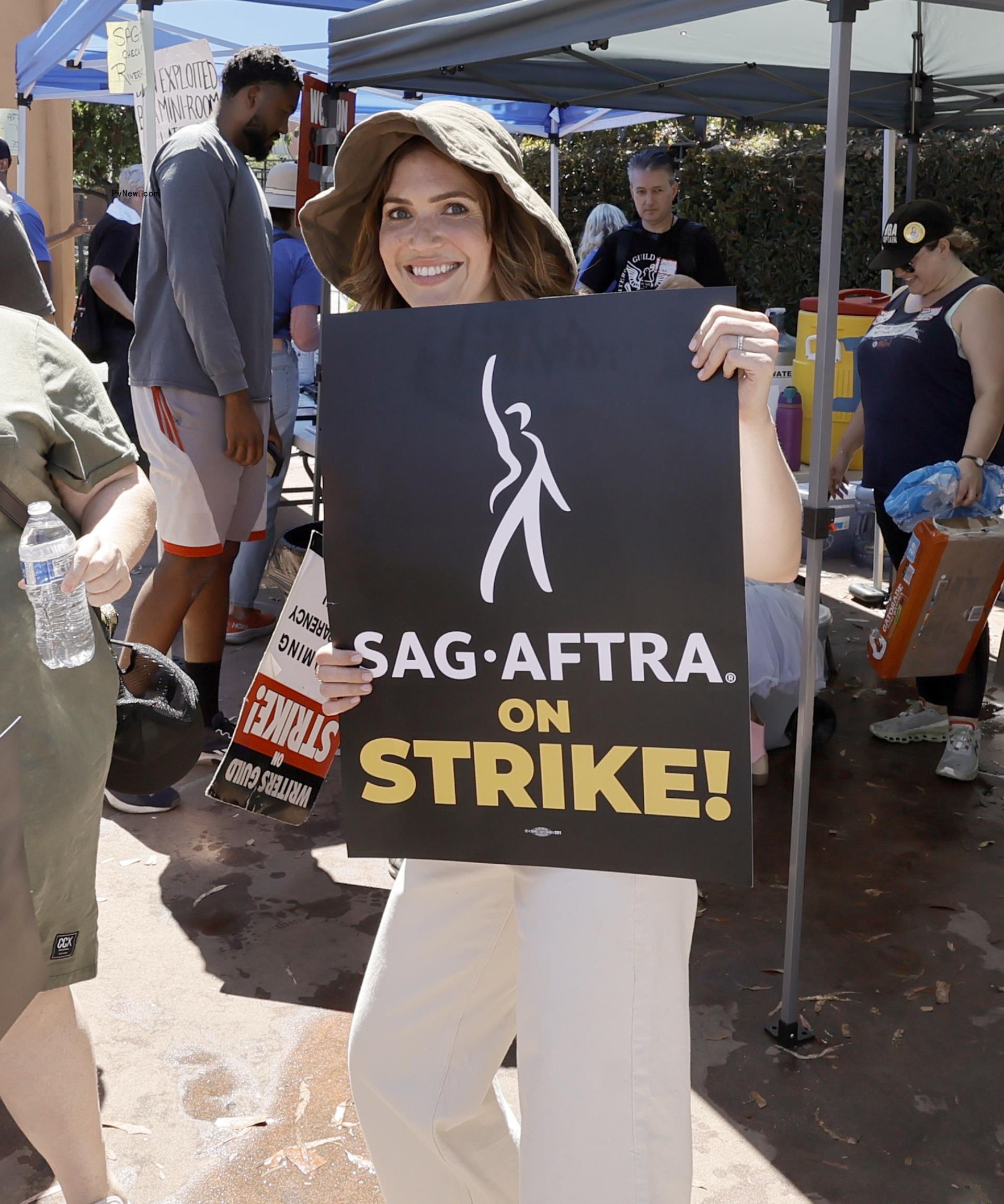 Mandy Moore picketing.