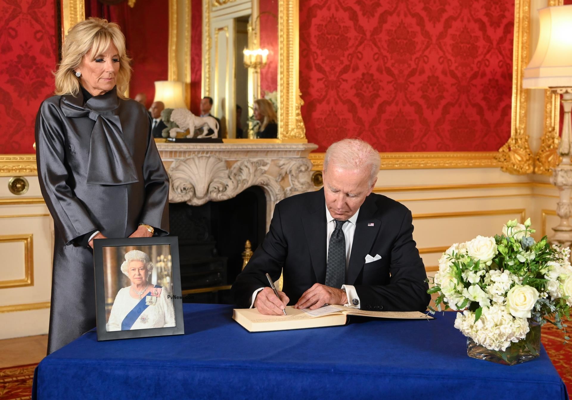 President Biden signing a book of co<i></i>ndolence in Lo<i></i>ndon for the Queen.