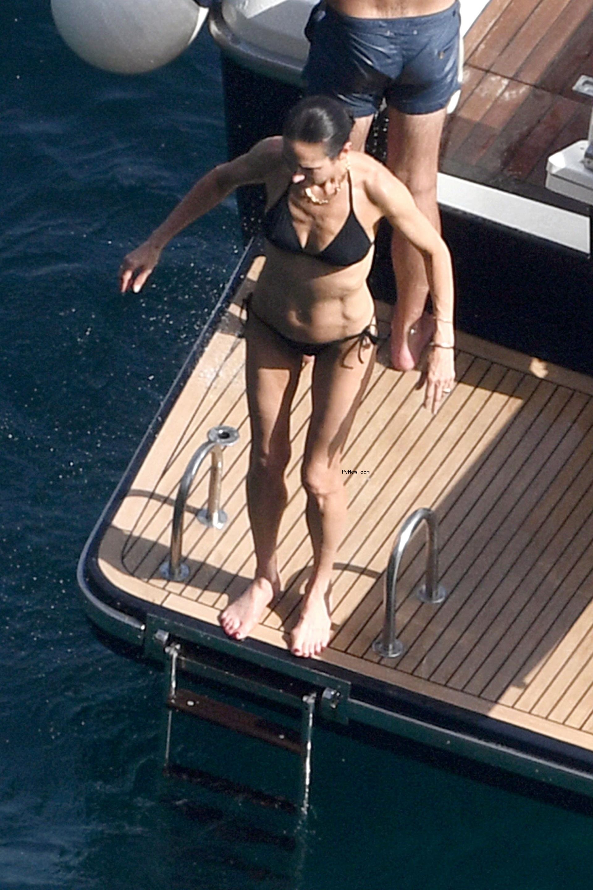 Jennifer Co<i></i>nnelly in a black bikini.