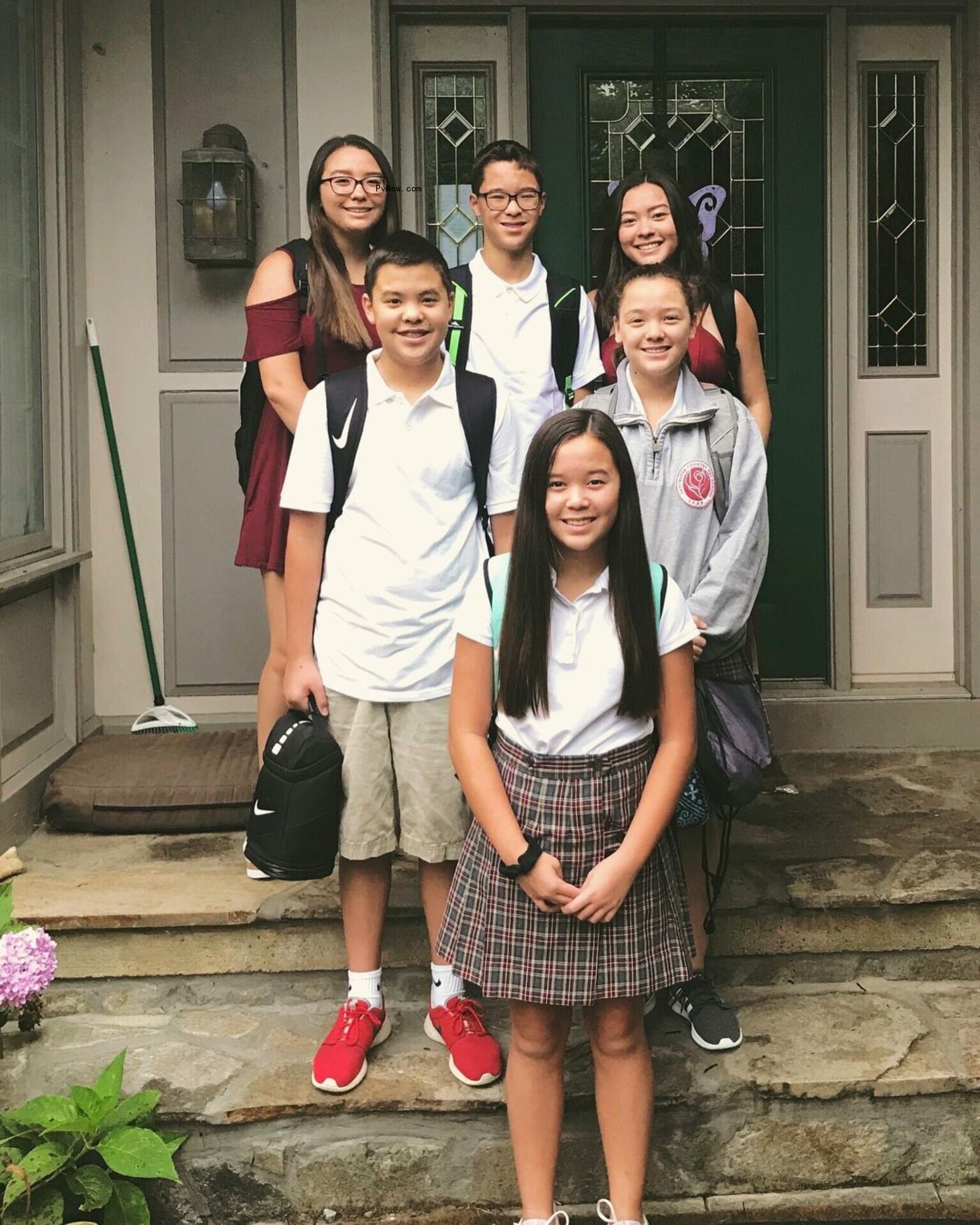 The Gosselin siblings posing for a photo in their uniforms.