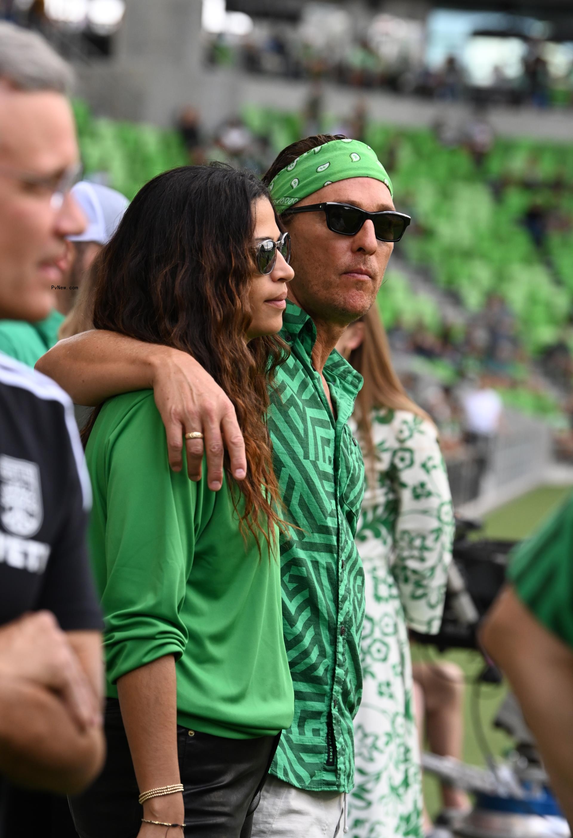 Matthew McCo<i></i>naughey sits in suit