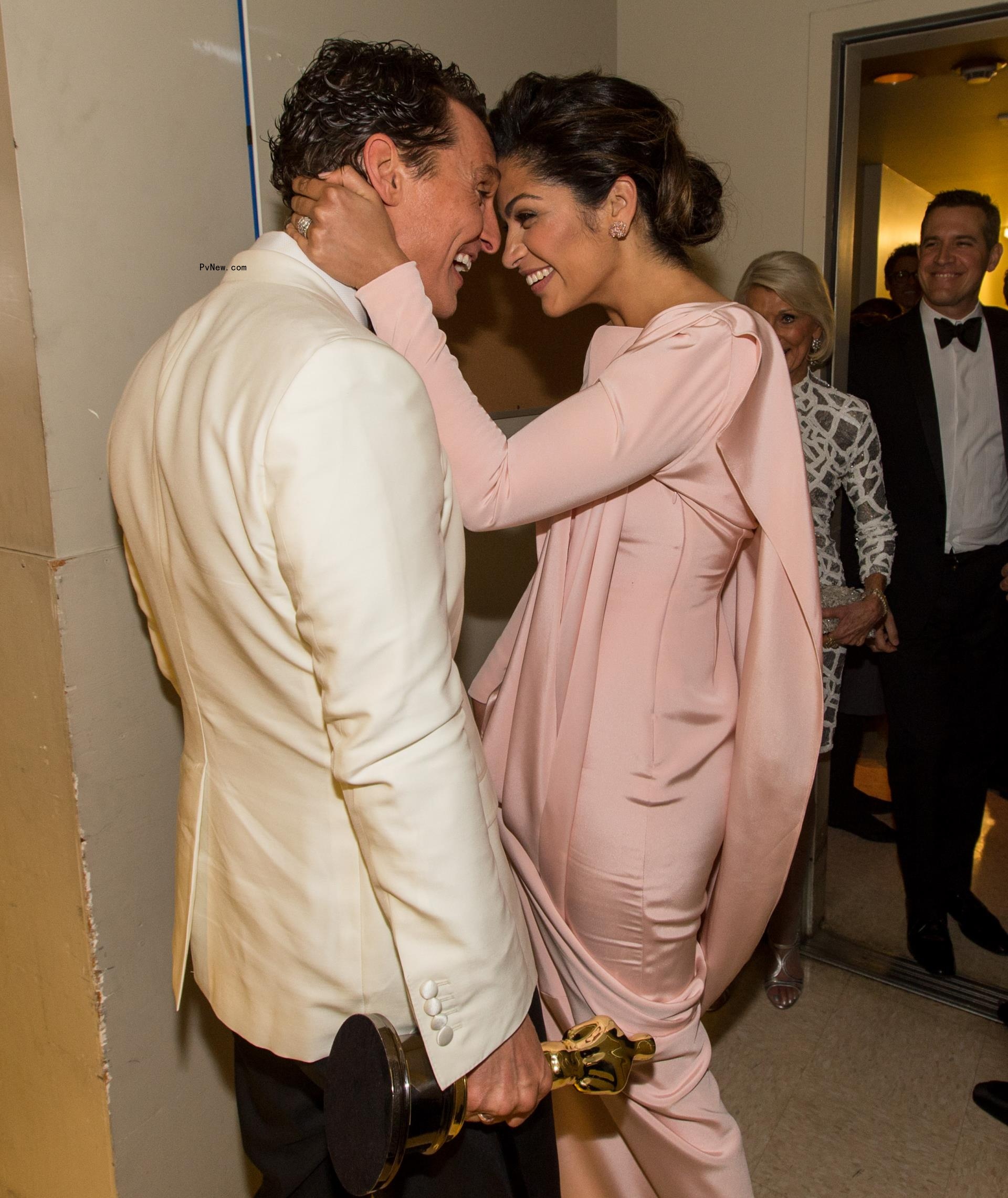 Camila Alves and Matthew McCo<i></i>naughey smile forehead-to-forehead
