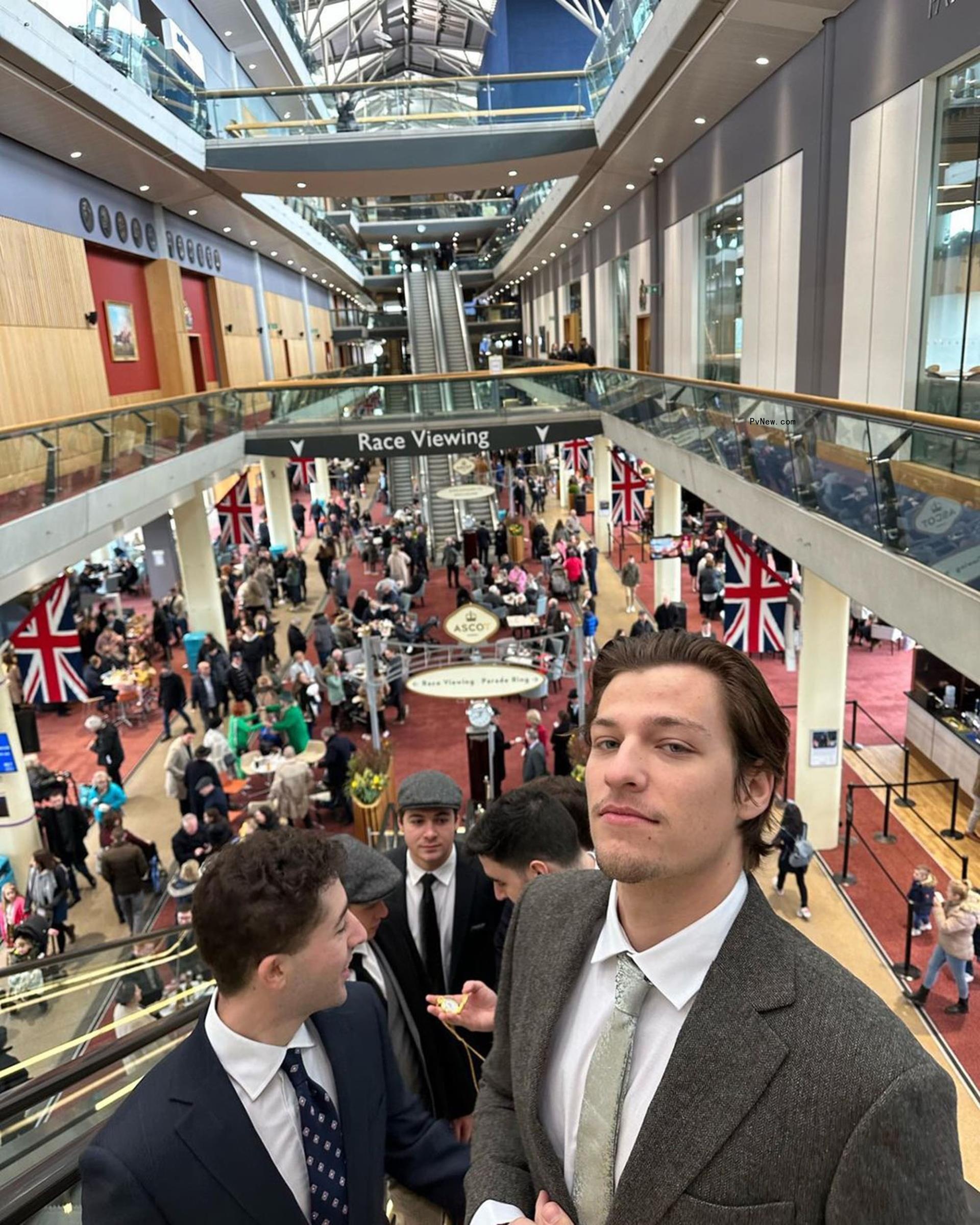 Jake Bo<i></i>ngiovi posing on an escalator.