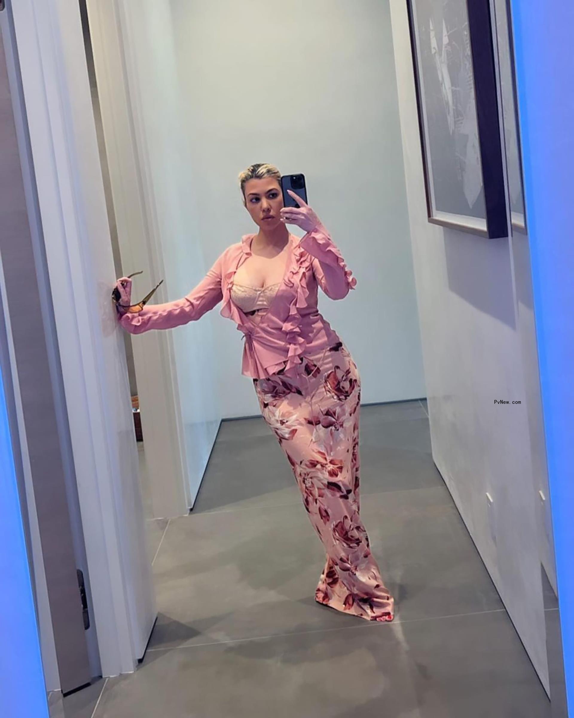 Kourtney Kardashian in an all-pink Easter outfit