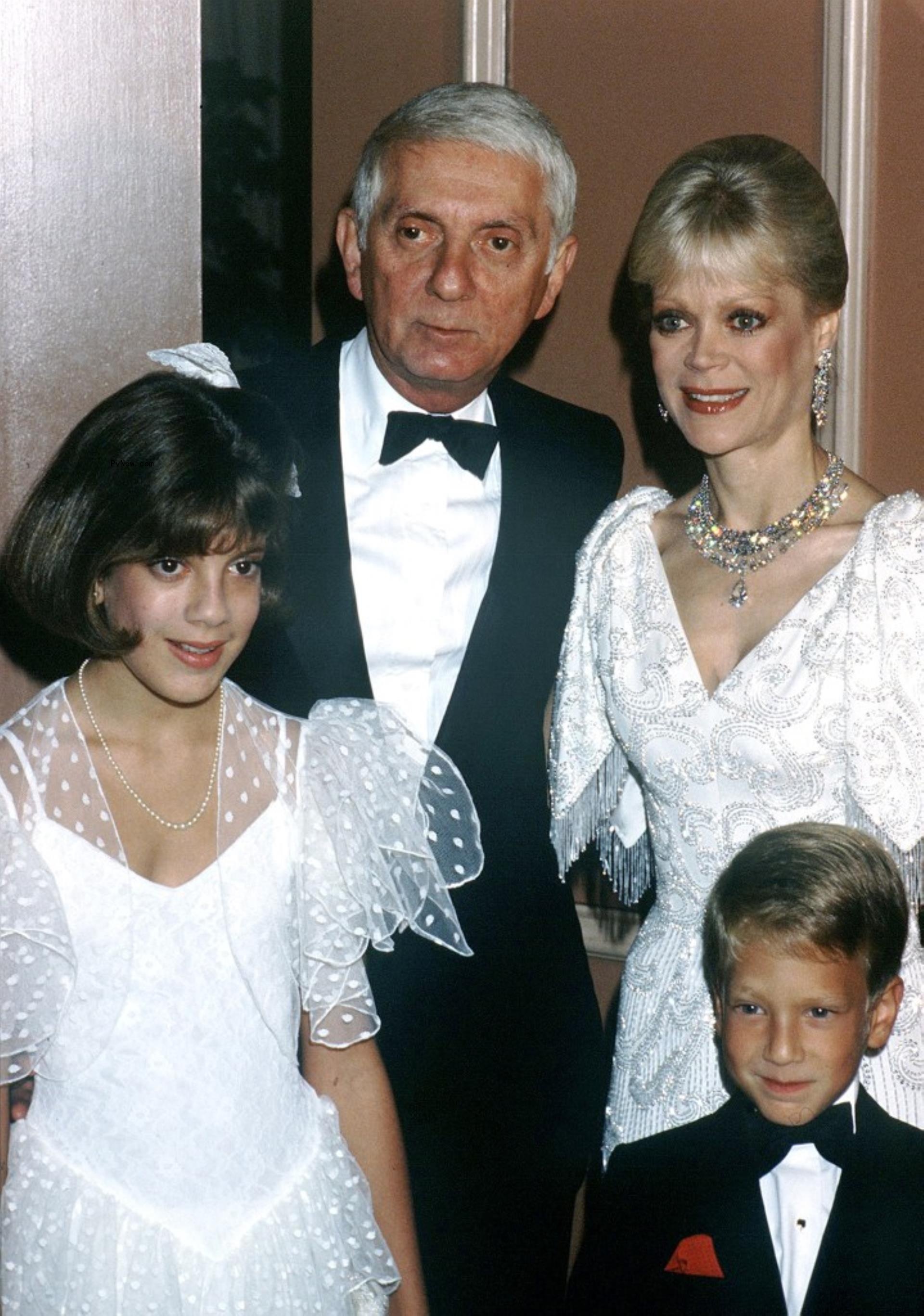 Aaron Spelling, Candy Spelling, Tori Spelling pose together with Randy Spelling
