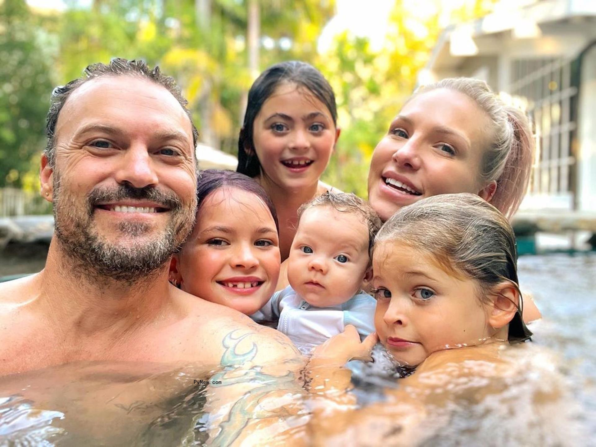 A photo of Sharna Burgess with Brian Austin Green’s kids