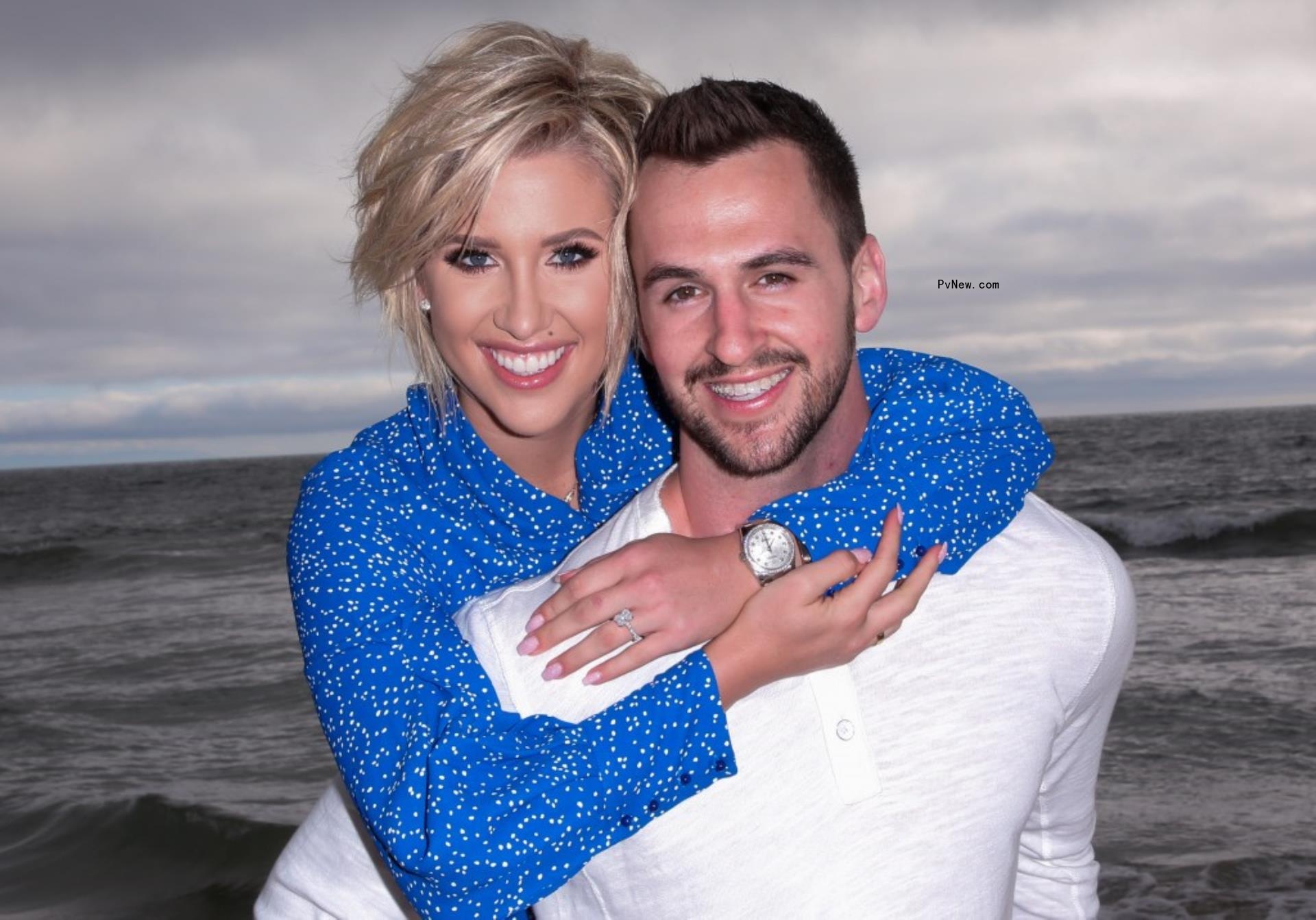 Nic Kerdiles and Savannah Chrisley hugging.