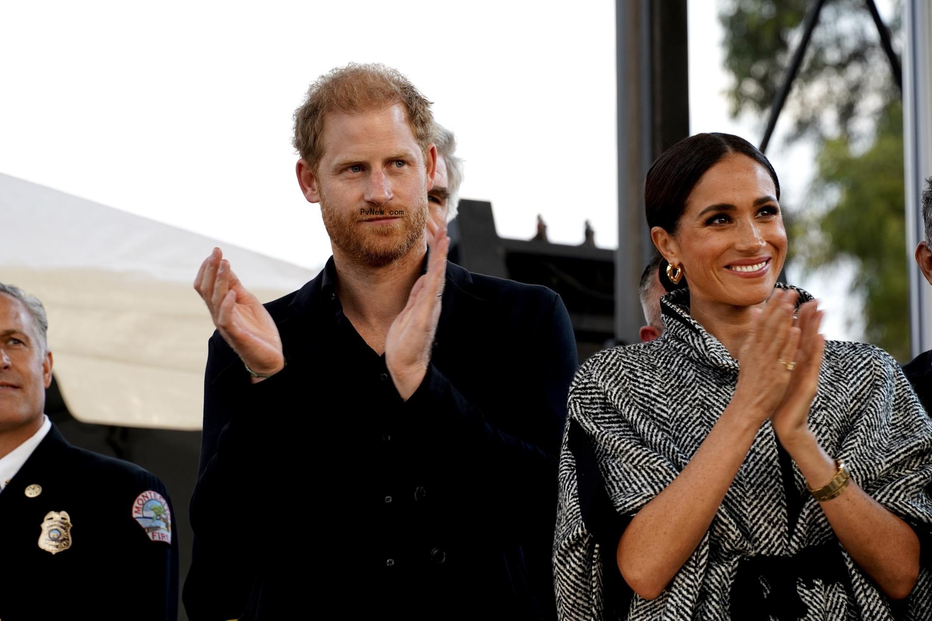Prince Harry and Meghan, at a benefit co<i></i>ncert for Santa Barbara first respo<i></i>nders hosted by Kevin Costner.