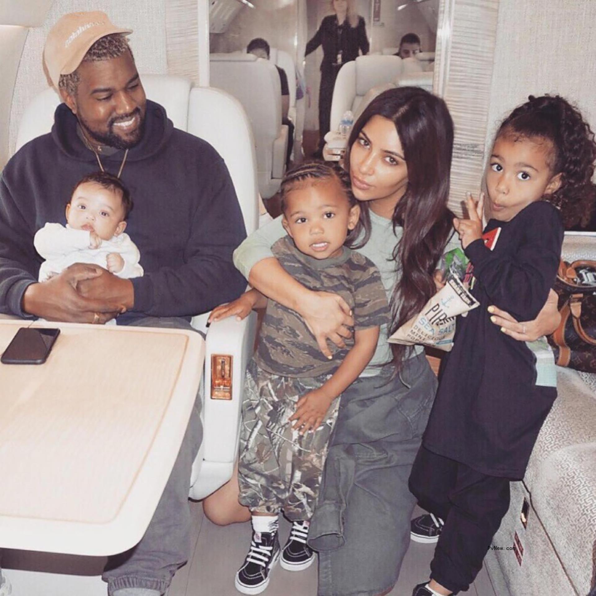 Kim Kardashian, Kanye West and their kids on a private jet. 