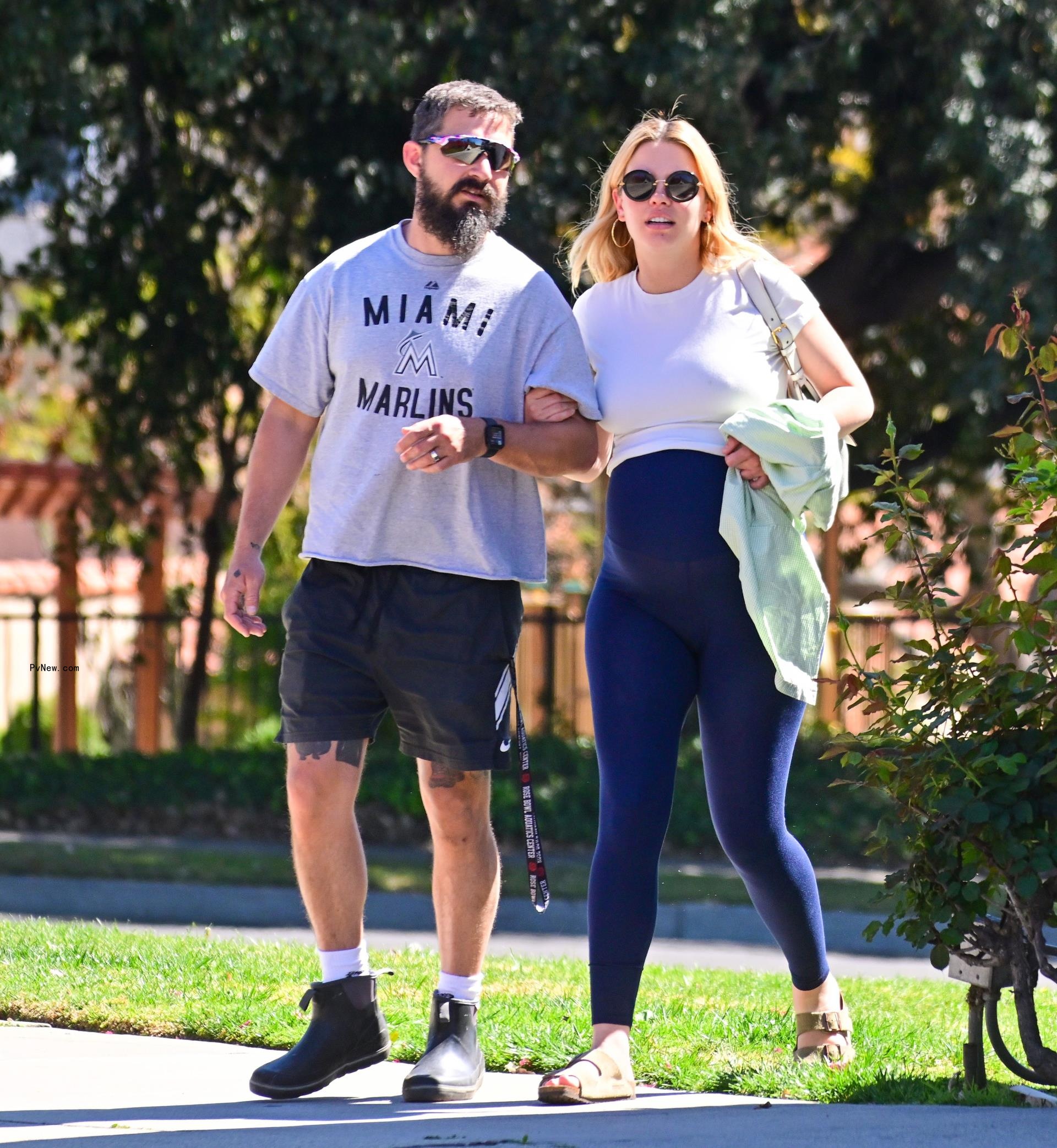 Shia LaBeouf and Mia Goth walking together