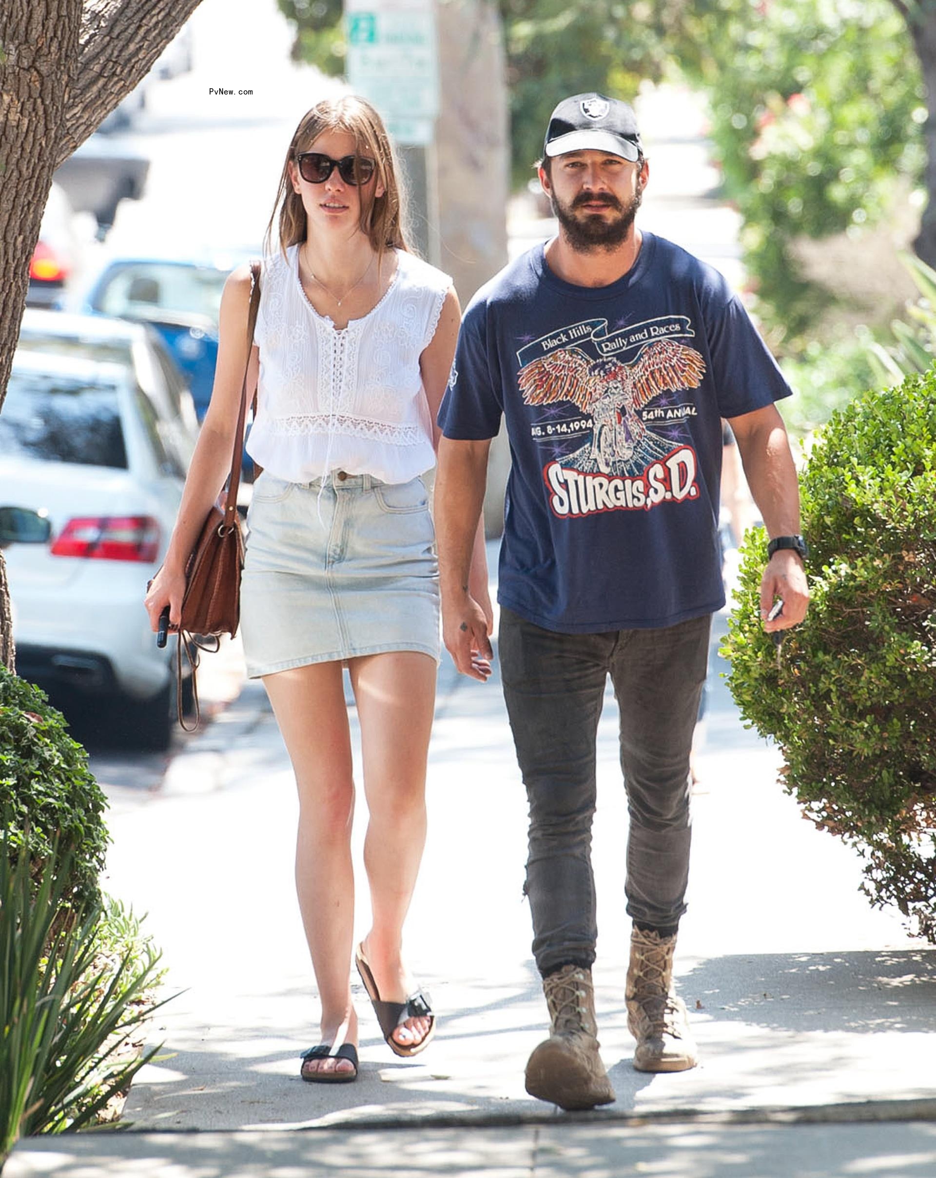 Shia LaBeouf and Mia Goth walking together