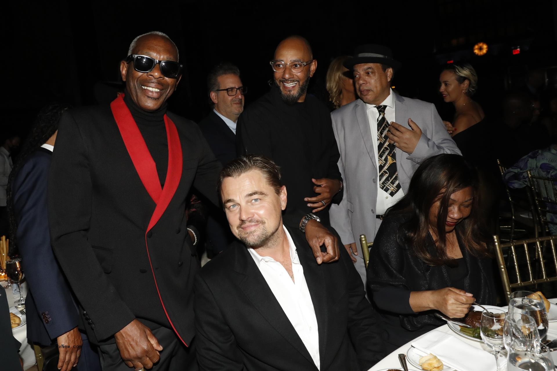 Leo<i></i>nardo DiCaprio, O.G. Jabar and Swizz Beatz with friends at a dinner.