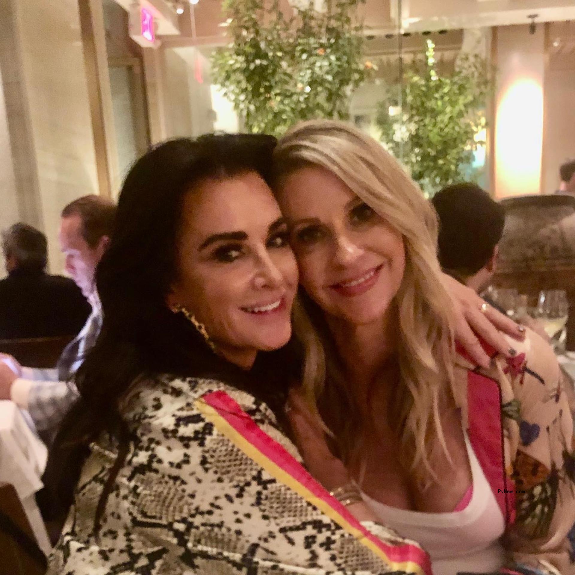 Kyle Richards holding Lorene Shea