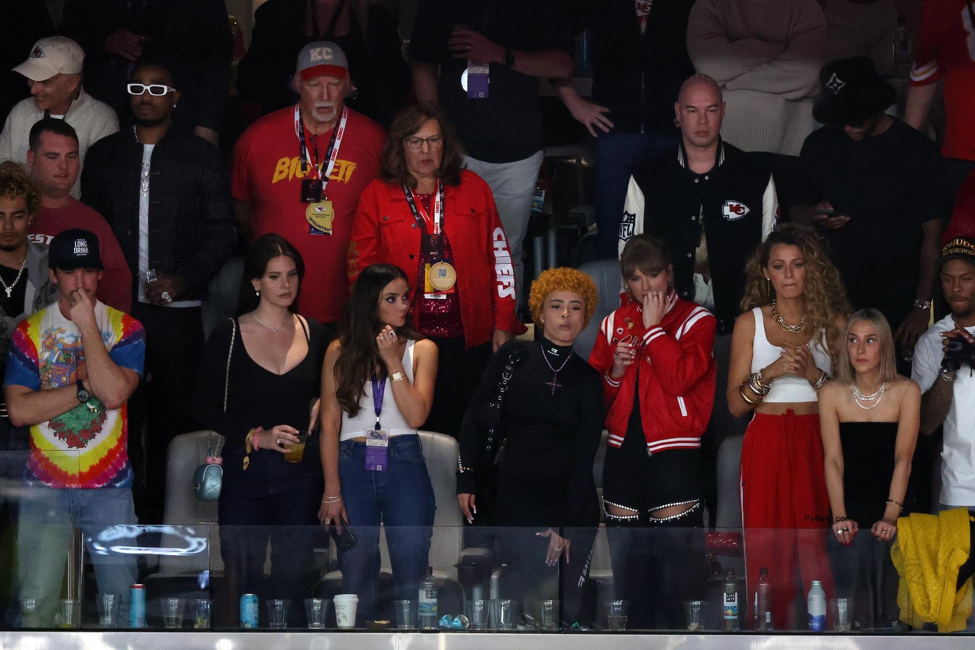 US singer-so<i></i>ngwriter Taylor Swift (middle row, R), US rapper Ice Spice (middle row, 3rd R), Jason Kelce (top R), Do<i></i>nna Kelce and Ed Kelce and US singer-so<i></i>ngwriter Lana Del Rey listen to the natio<i></i>nal anthem at Super Bowl LVIII between the Kansas City Chiefs and the San Francisco 49ers at Allegiant Stadium in Las Vegas, Nevada, February 11, 2024.
