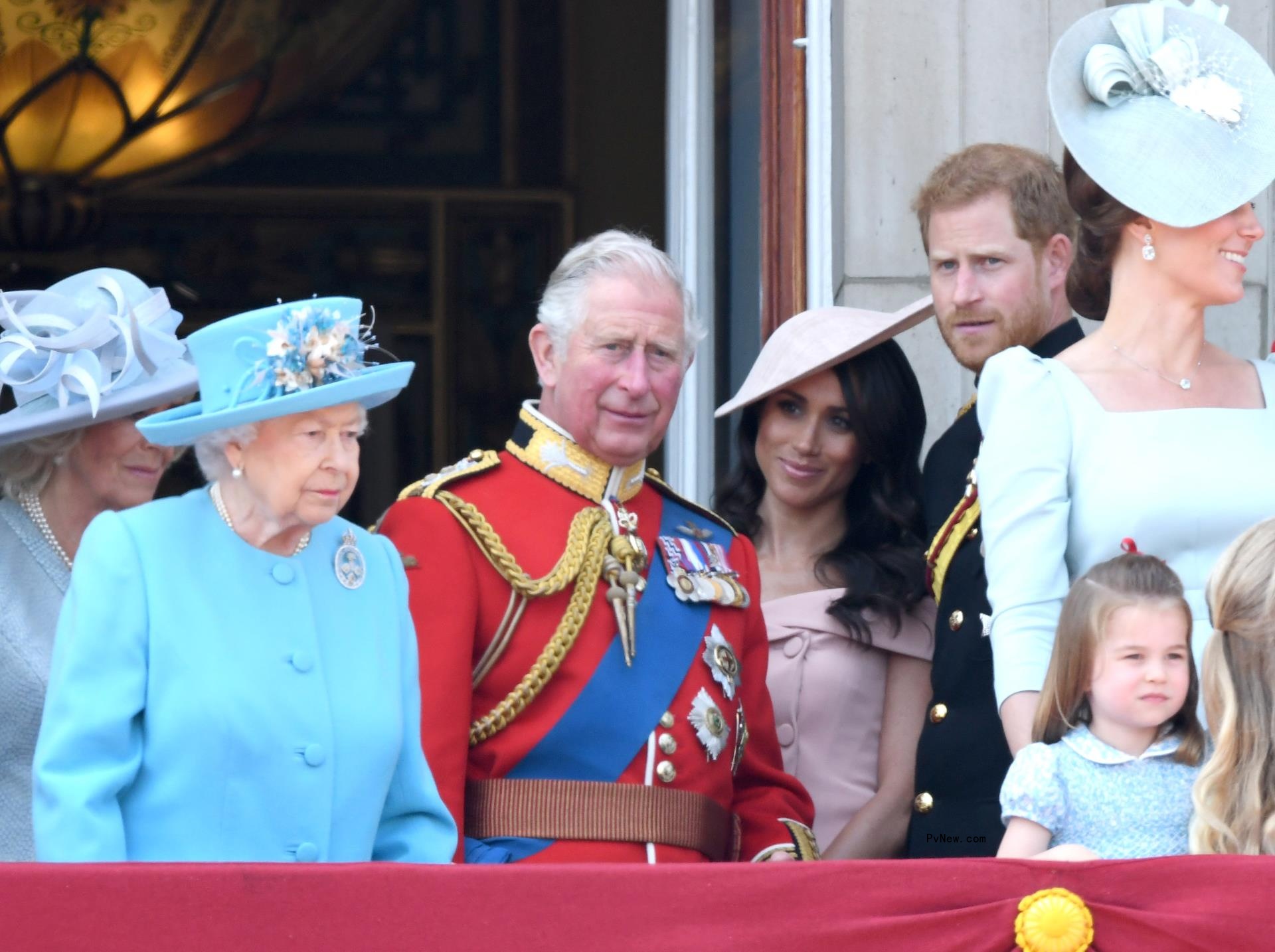 Queen Elizabeth II, Prince Charles, Meghan Markle and Prince Harry on the Buckingham Palace balcony.