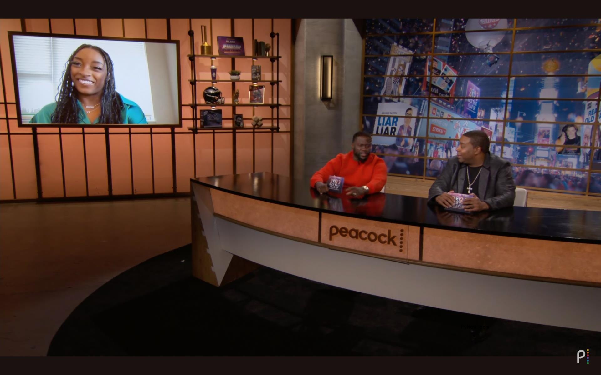 Simone Biles, Kenan Thompson and Kevin Hart during an interview.
