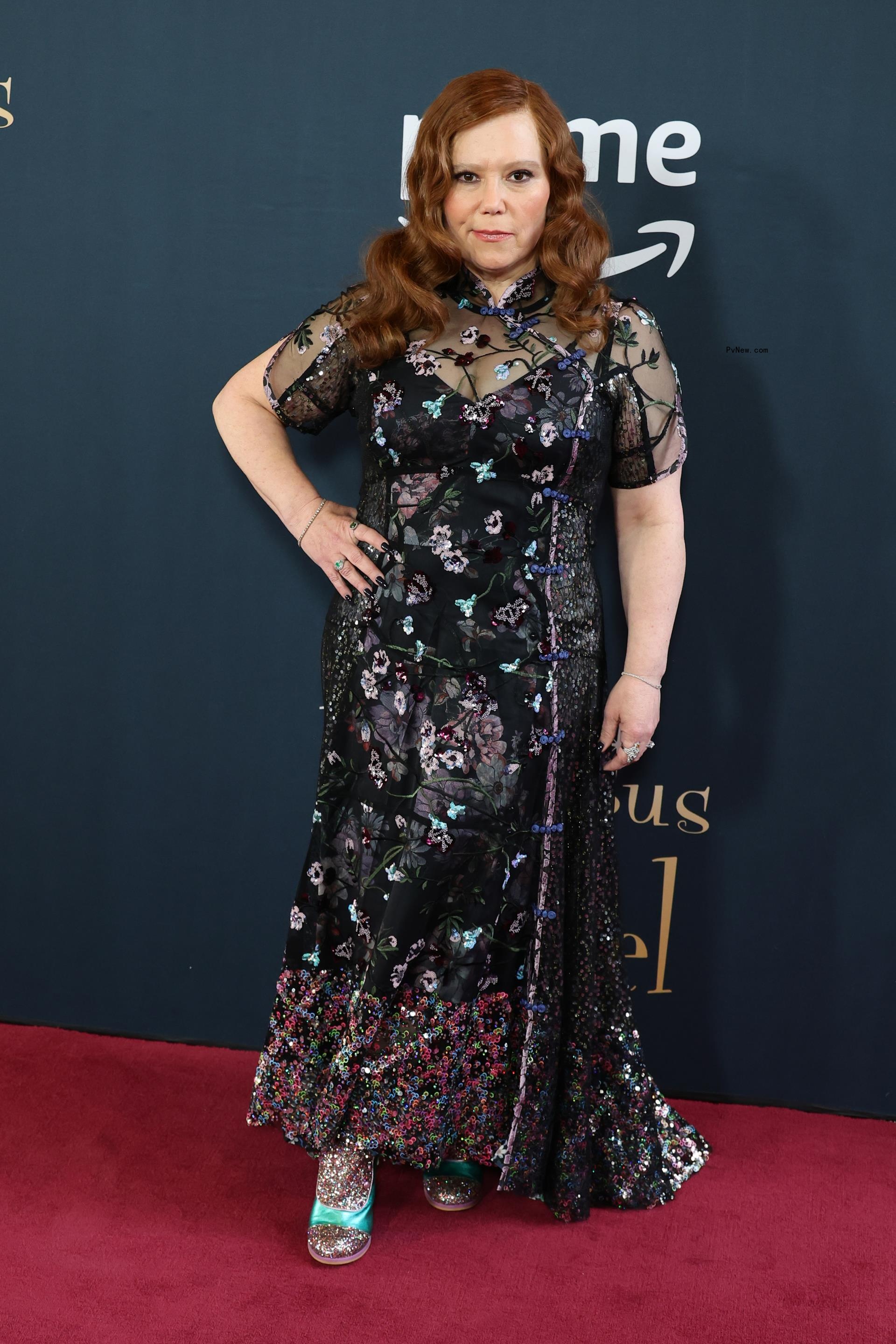 Alex Borstein posing on a red carpet