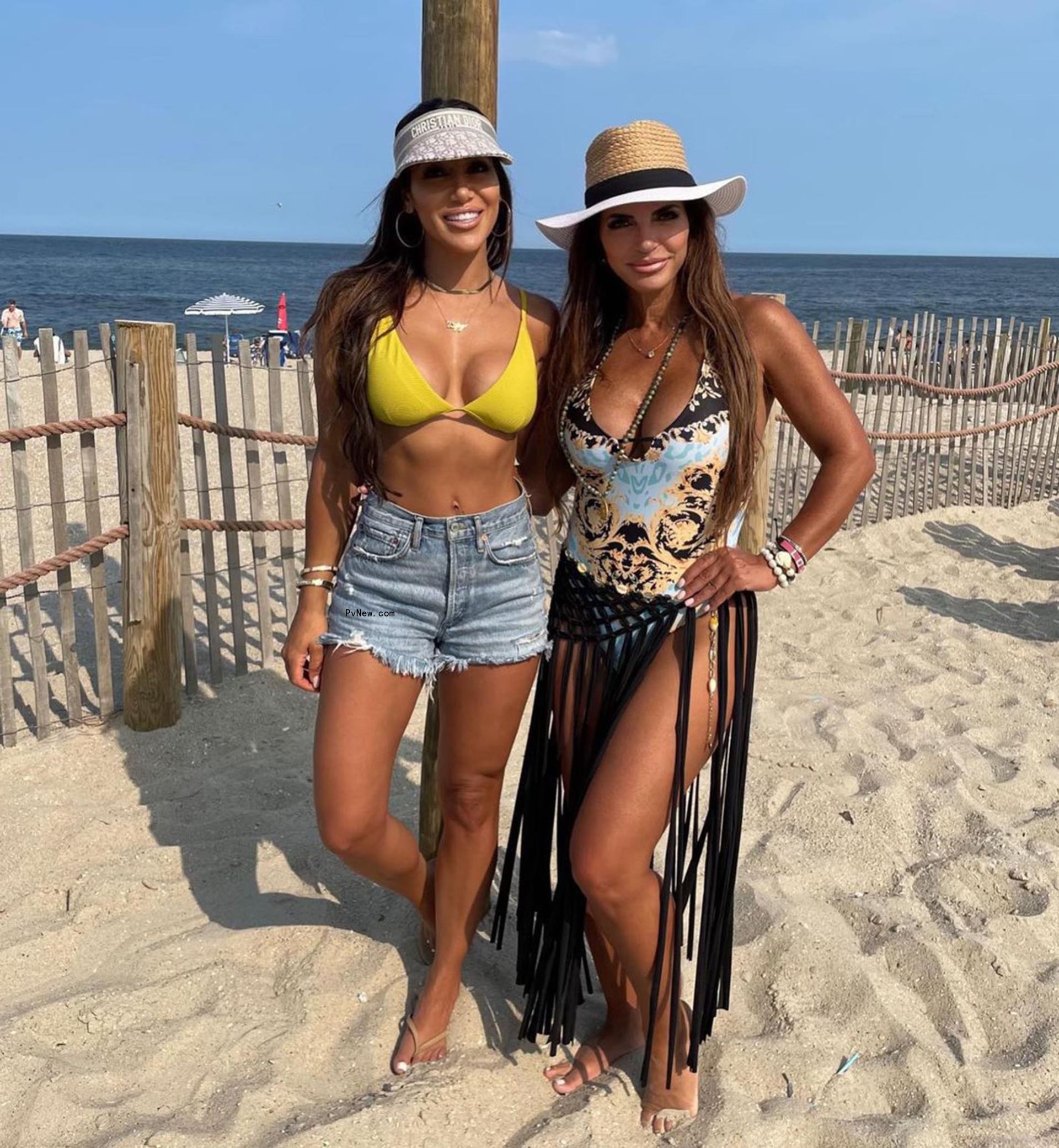 Teresa Giudice and Melissa Gorga on a beach.