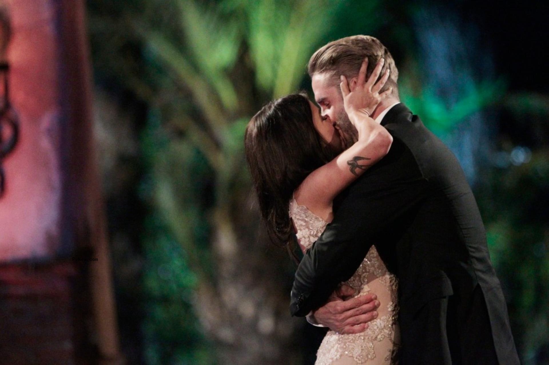 Shawn Booth and Kaitlyn Bristowe kissing.