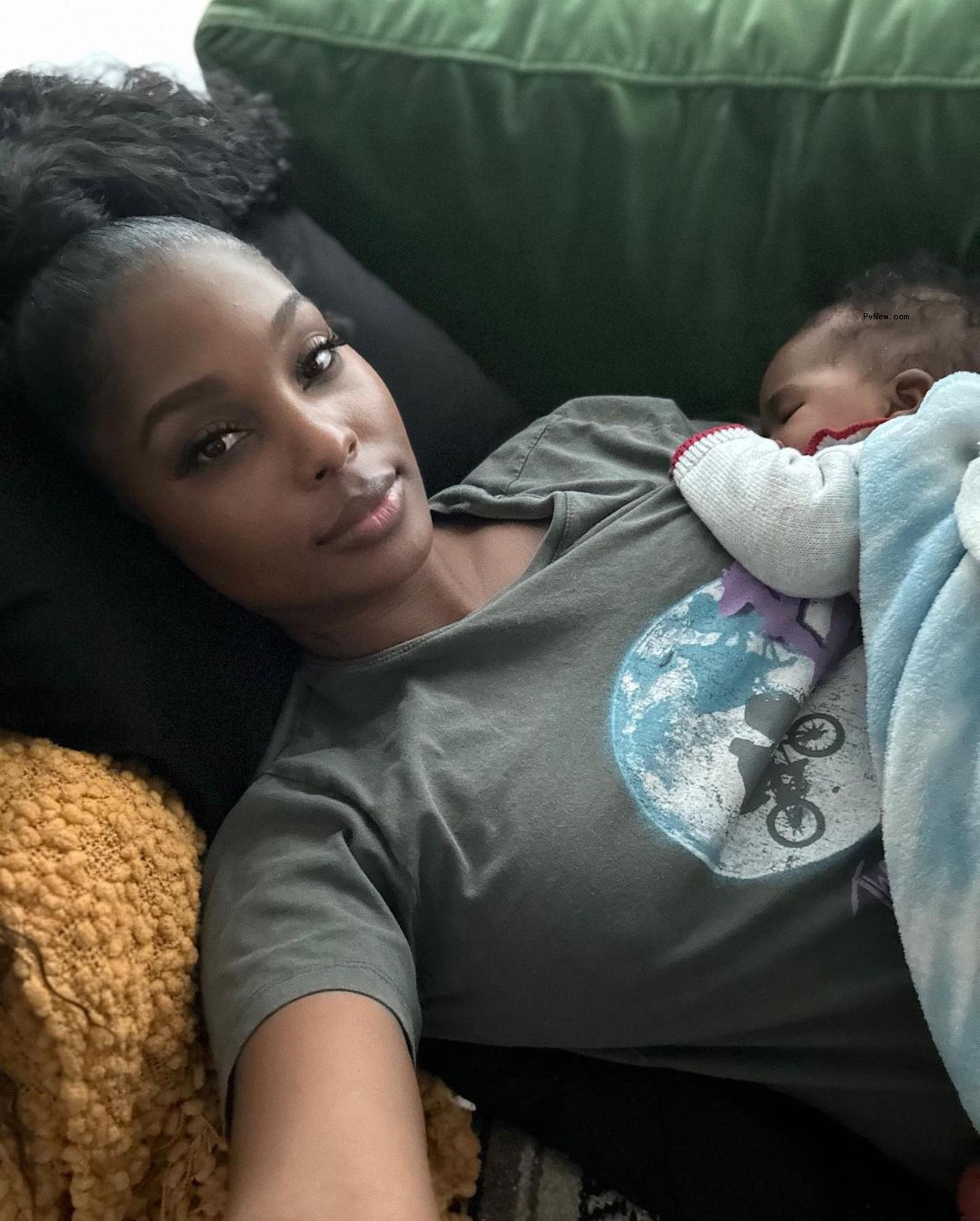 LaNisha Cole cuddles daughter Onyx