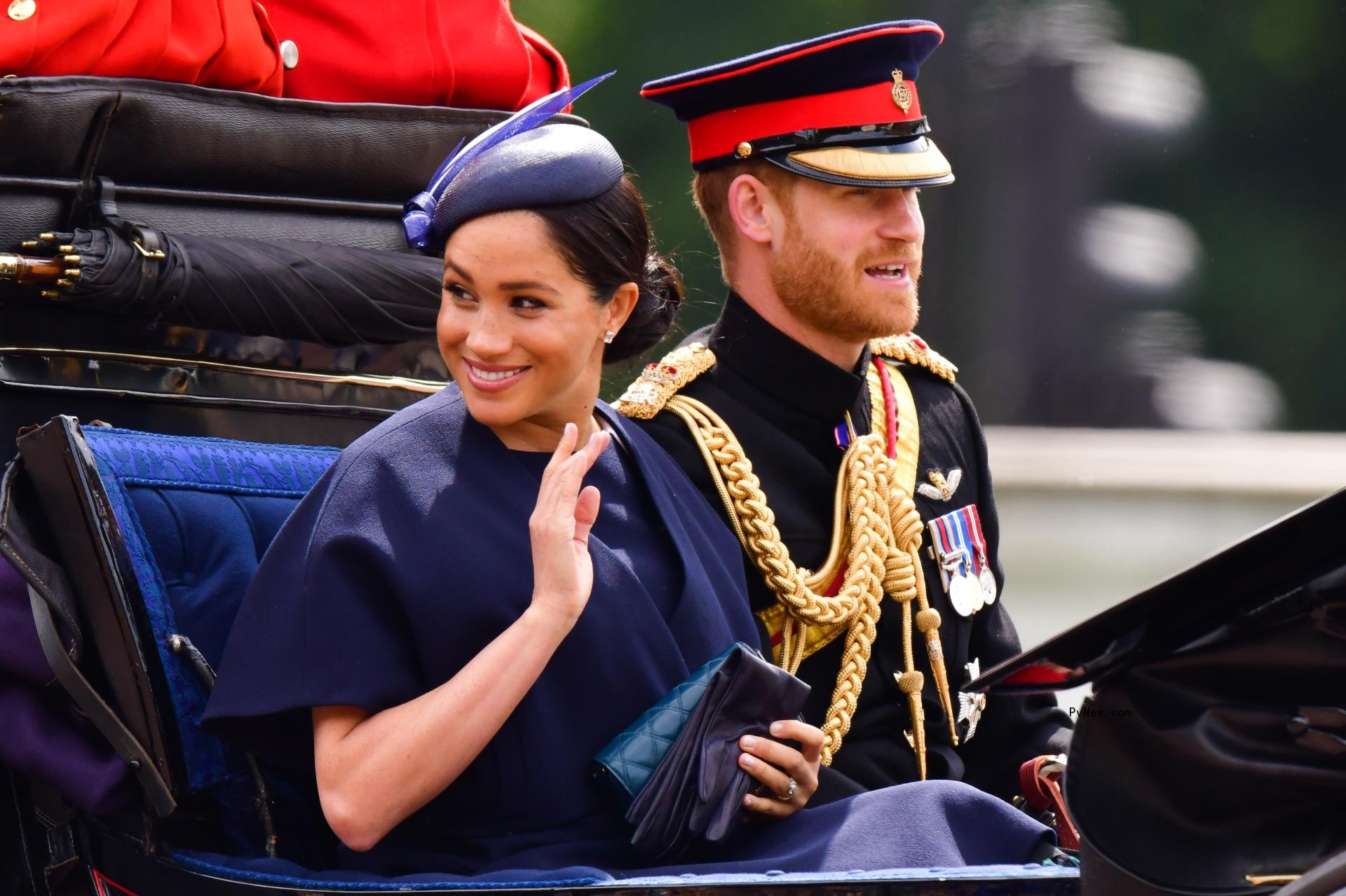 Meghan Markle and Prince Harry in a horse-drawn carriage