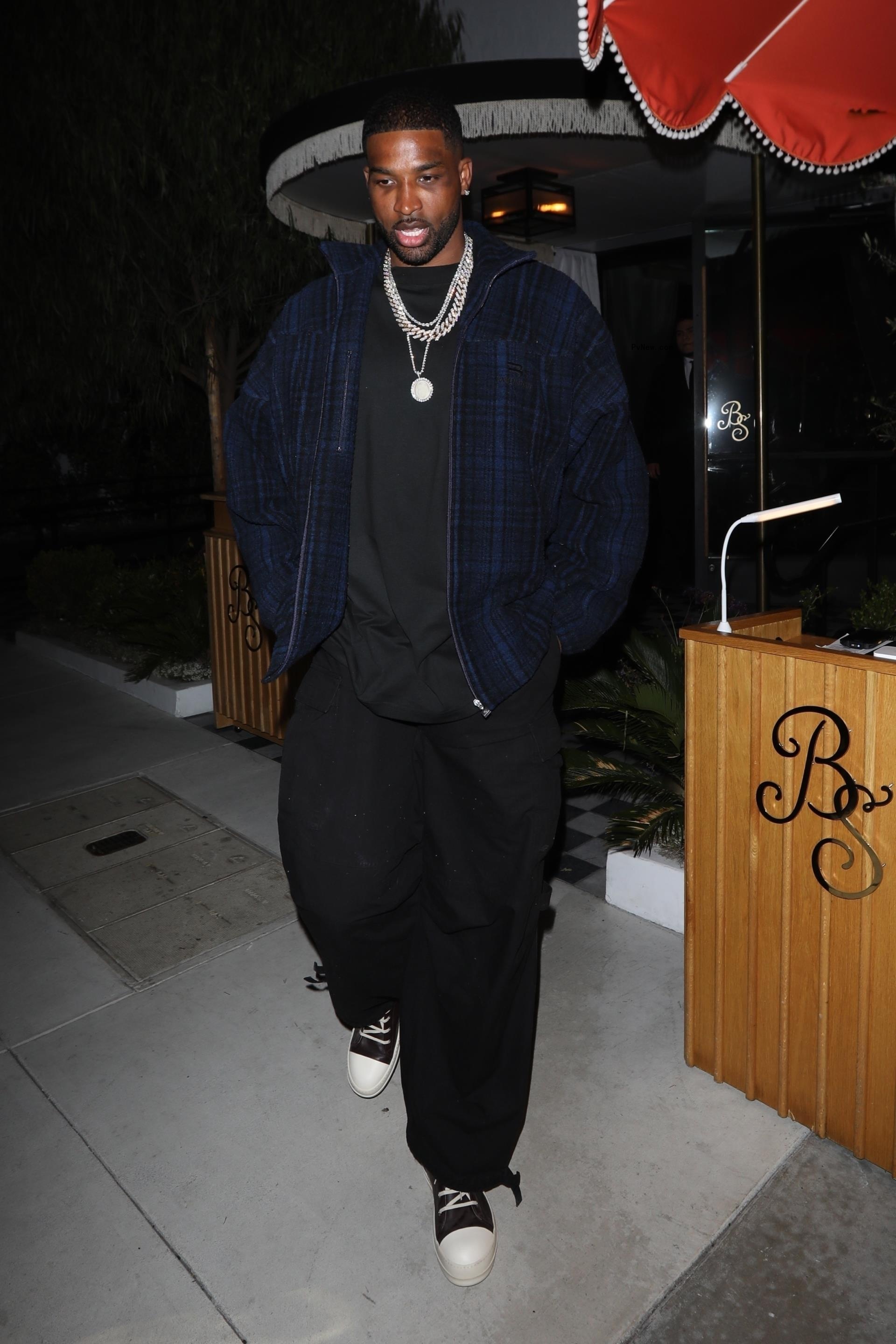 Tristan Thompson walking with his hands in his pockets out in LA.