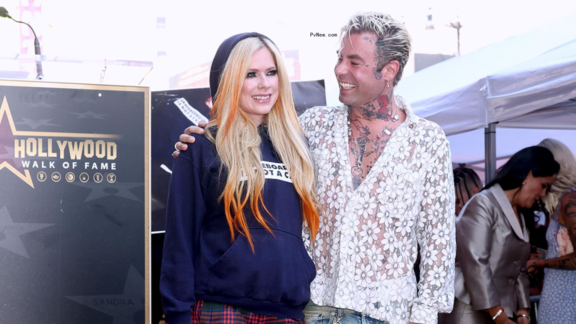 Avril Lavigne Celebrates Walk of Fame Star With Machine Gun Kelly, Mod Sun and More: ‘Can’t Wait for the Next 20 Years, Bitches!’