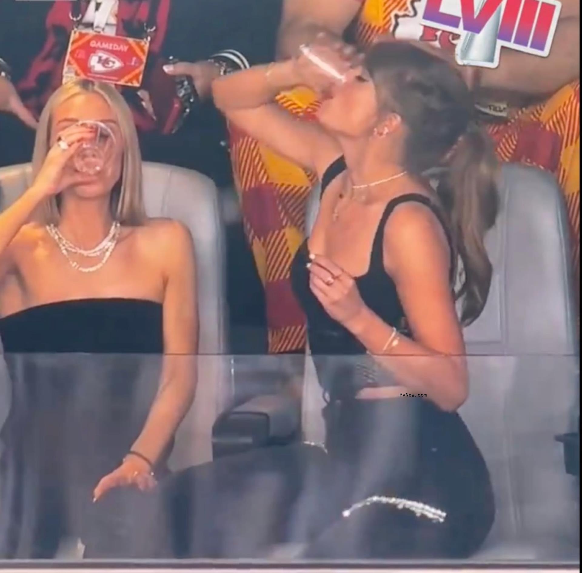 taylor swift and ashley avignone chugging a beer